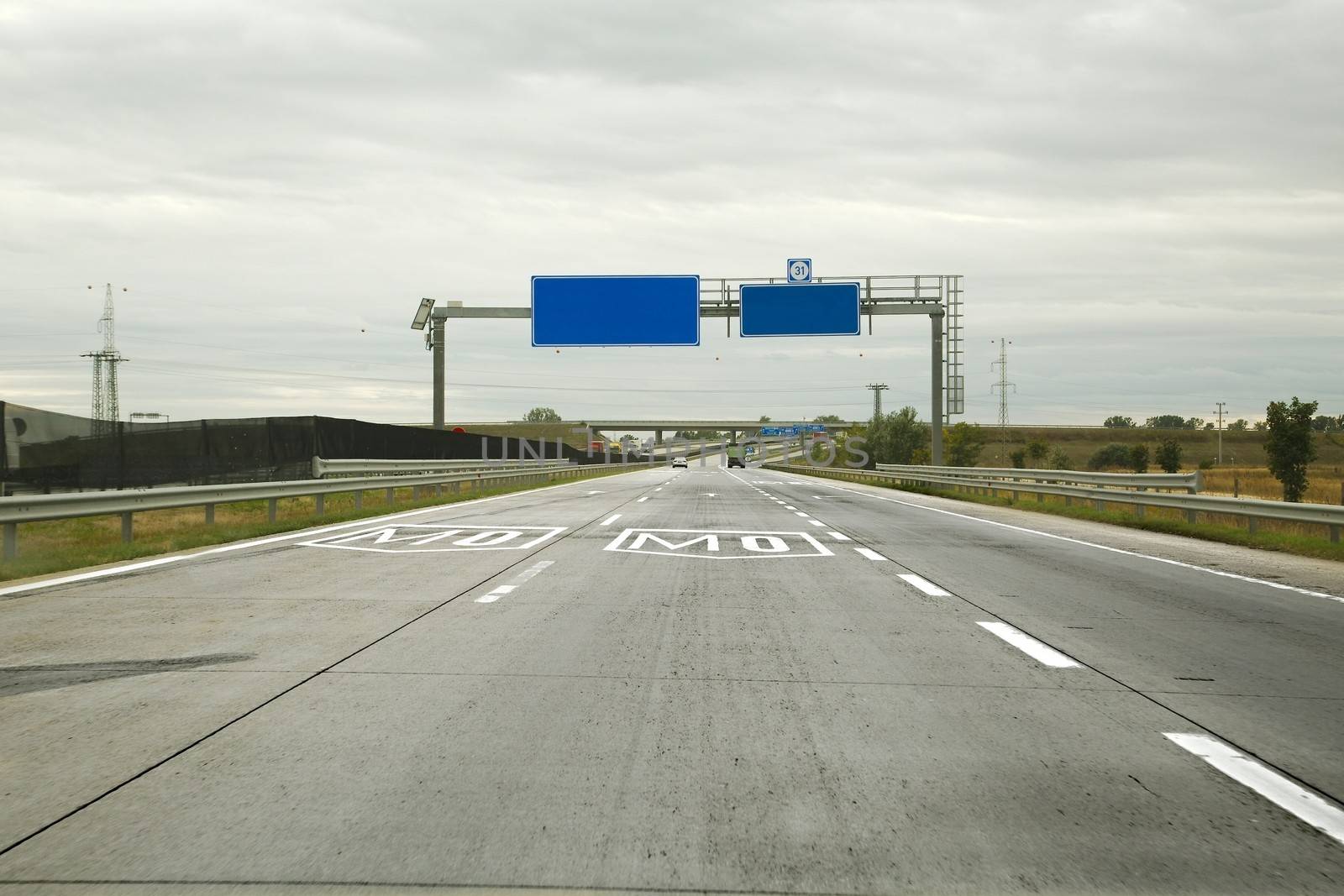 Empty highway with empty signboard