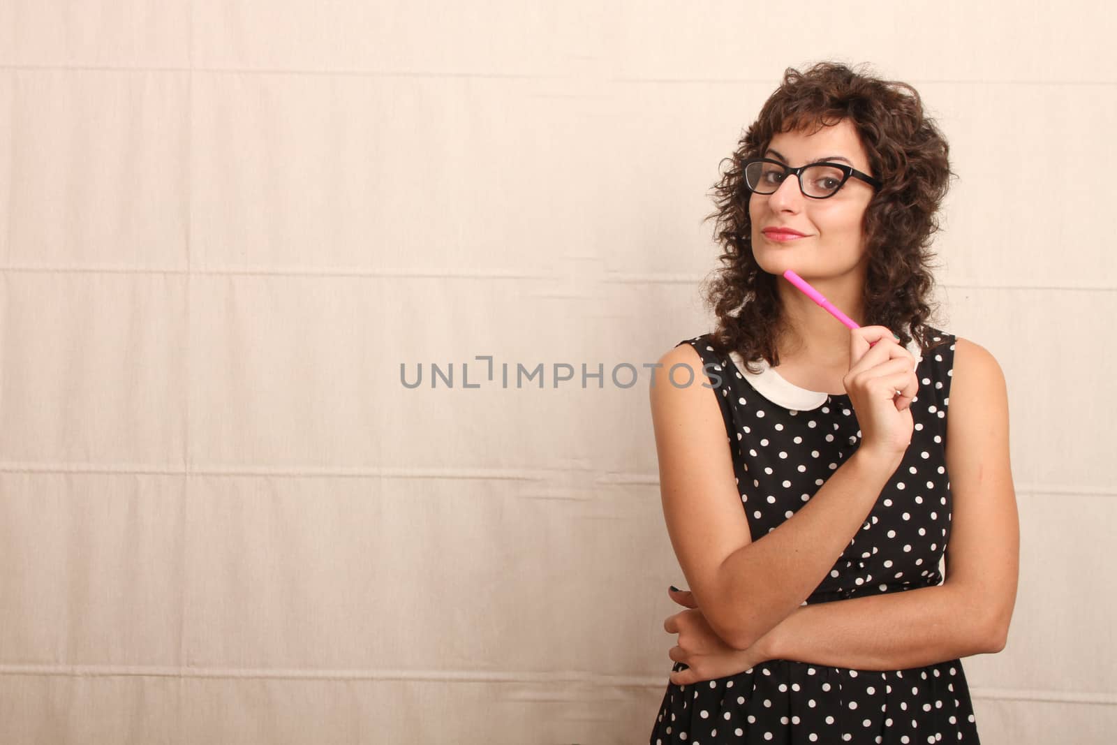 Portrait of a pensive woman in a vintage dress.
