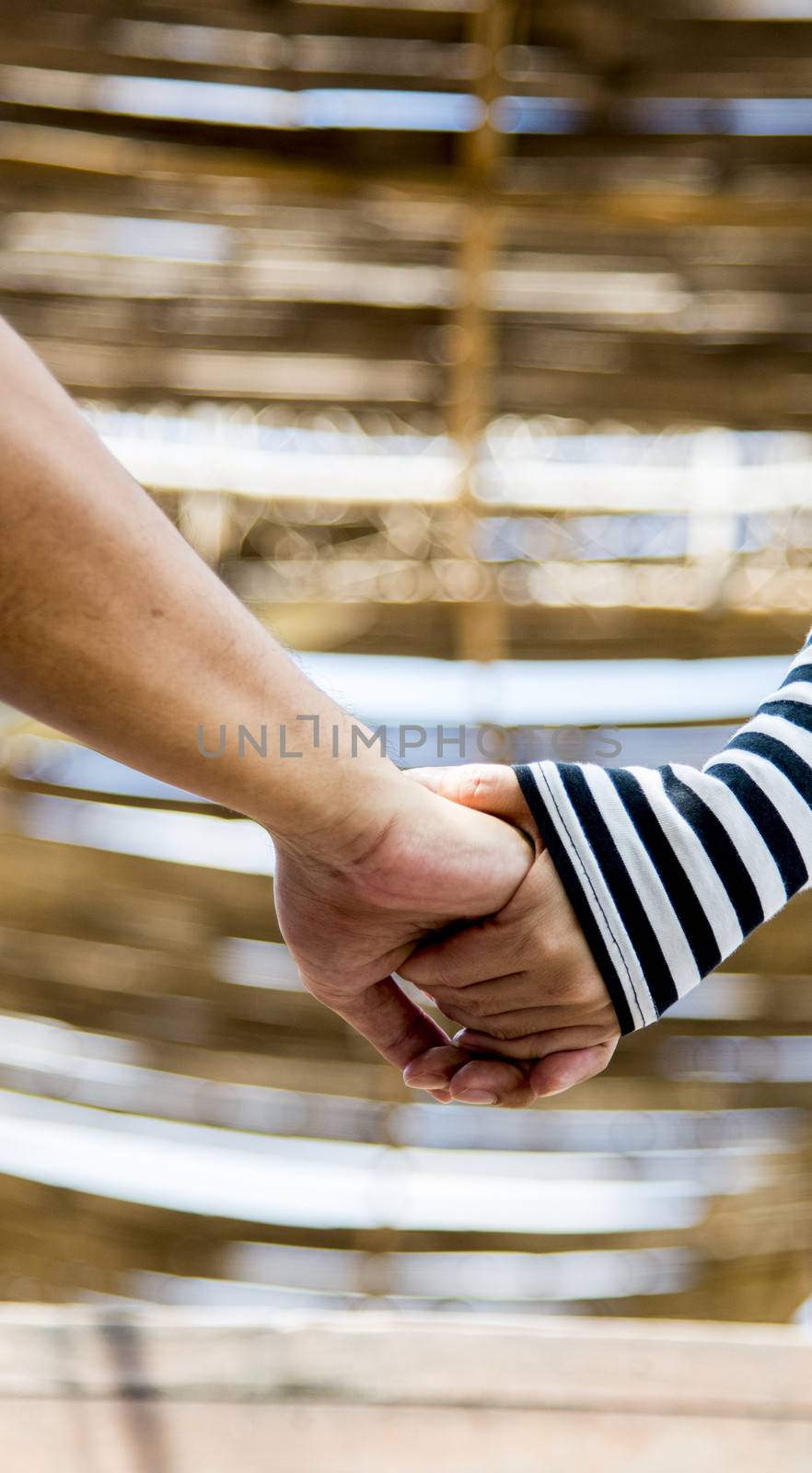 Hold hands of couple