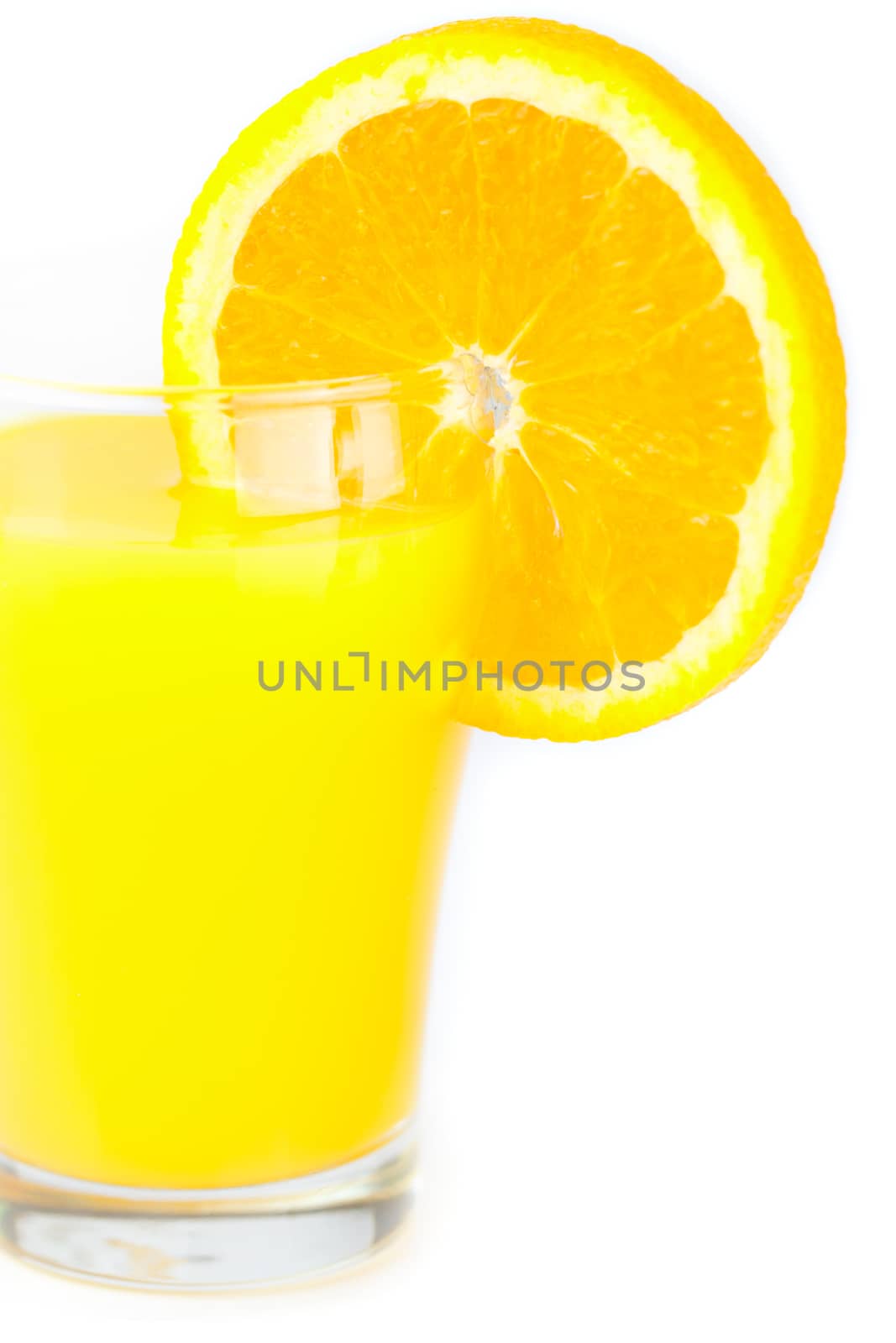 orange and a glass of orange juice isolated on white by jannyjus