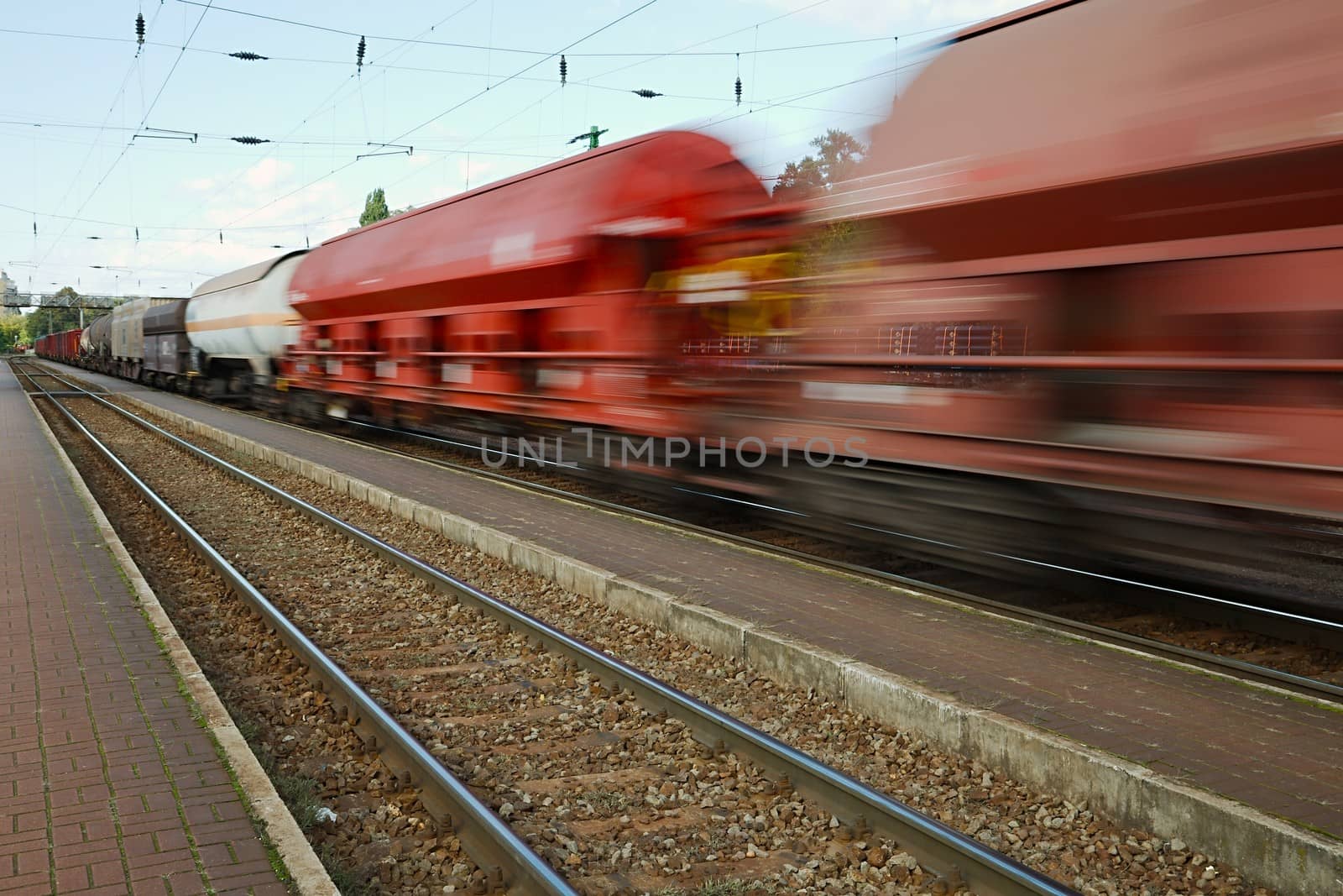 Freight train passing by with blur