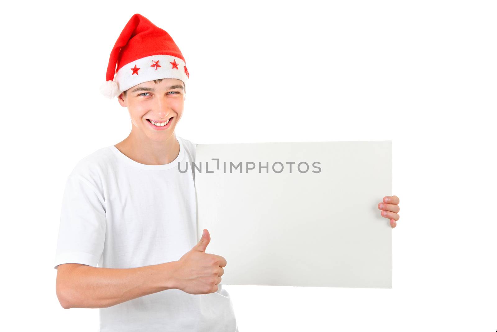 Happy Teenager holds White Board and shows OK gesture Isolated On The White Background