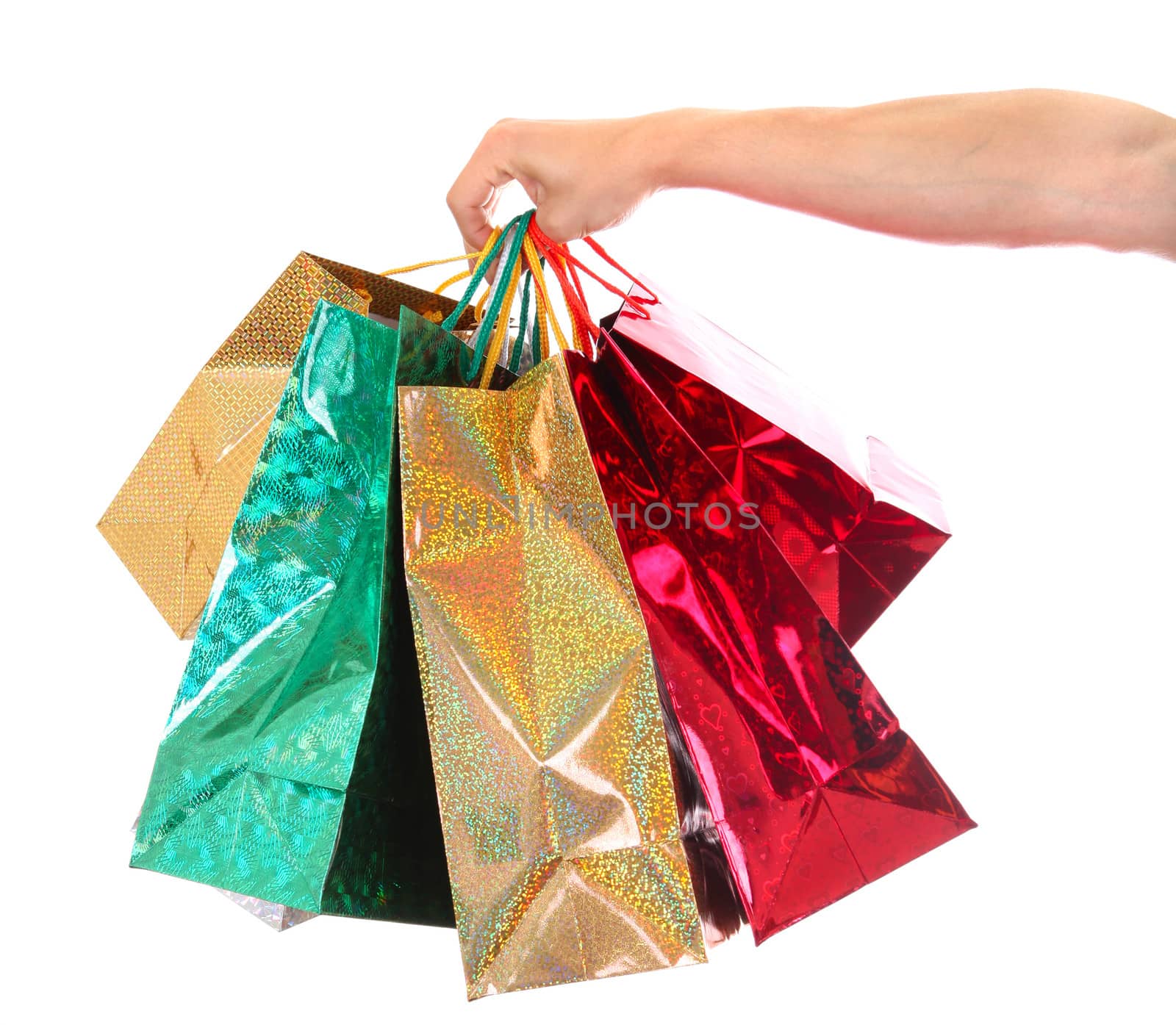 Shopping Bags in a Hand Closeup Isolated On The White Background