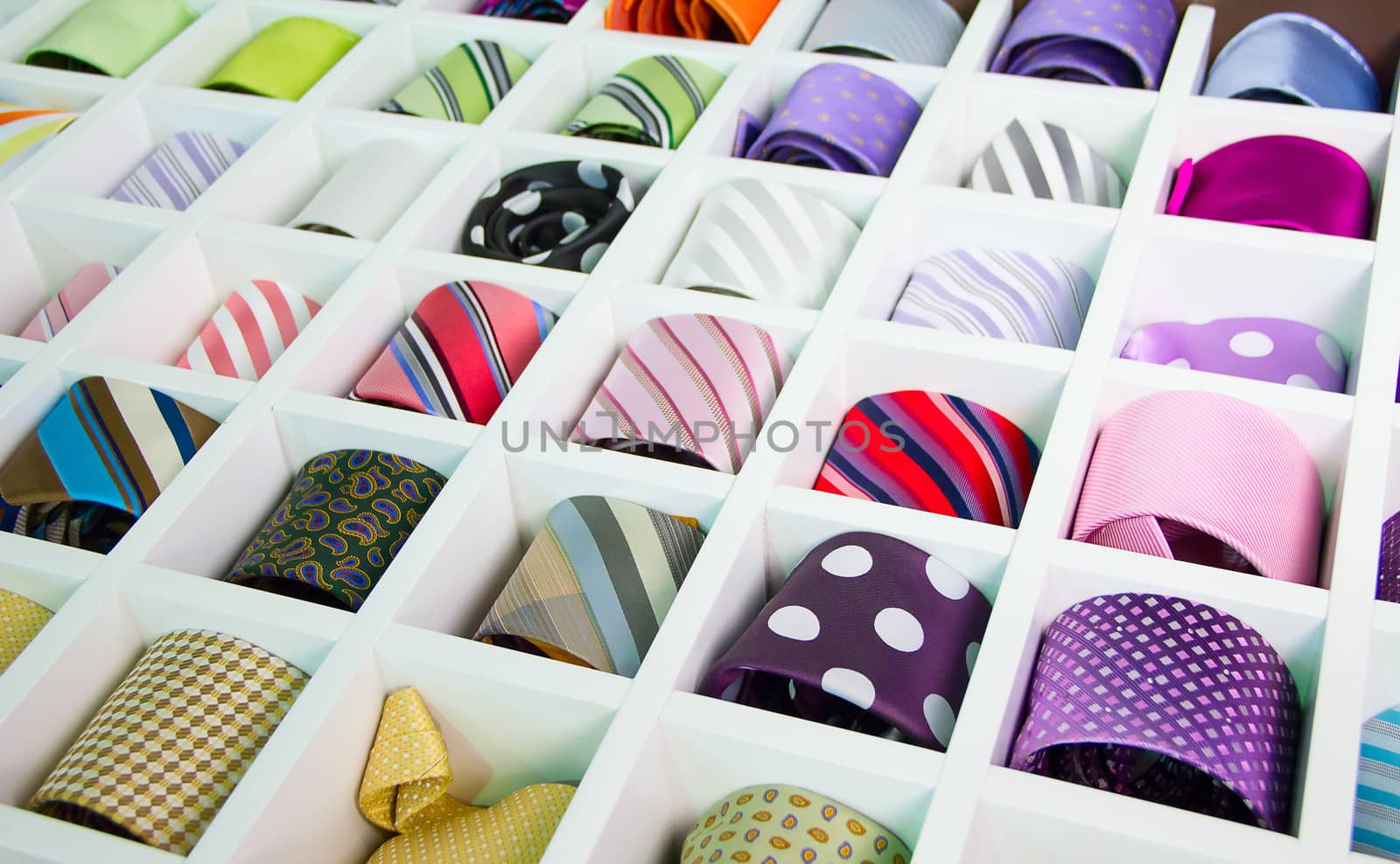 Shelf full of fine silk neckties on a Chinese street market