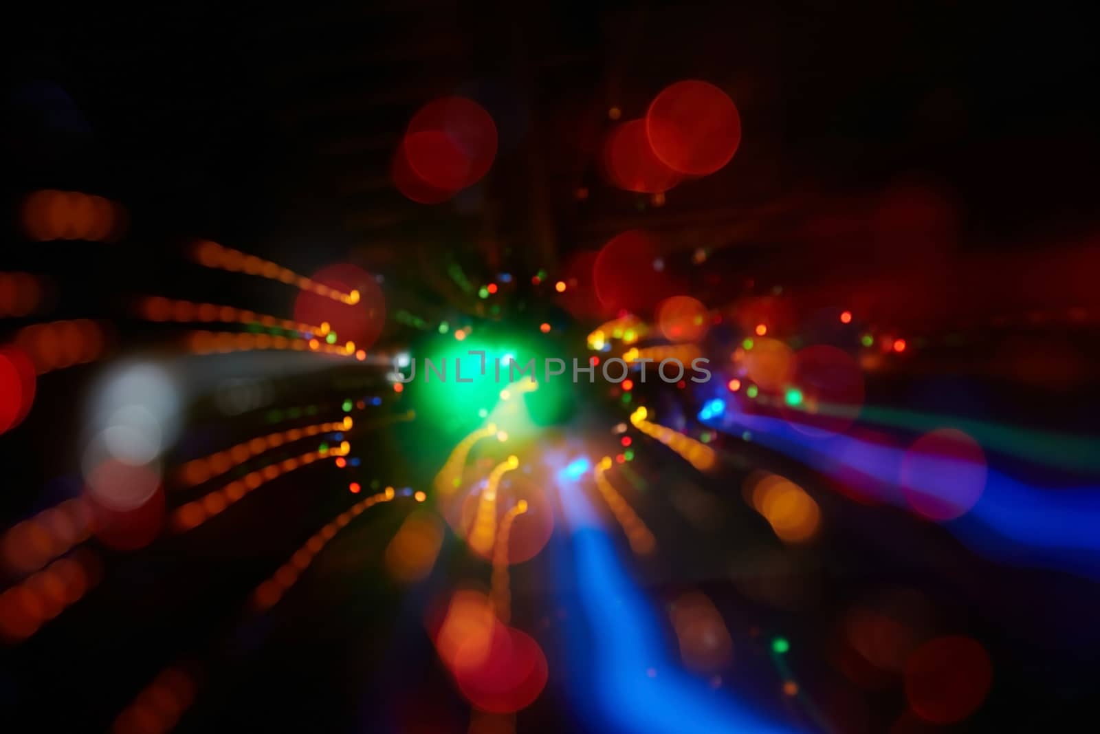 Abstract background with colorful spheres of defocused illumination
