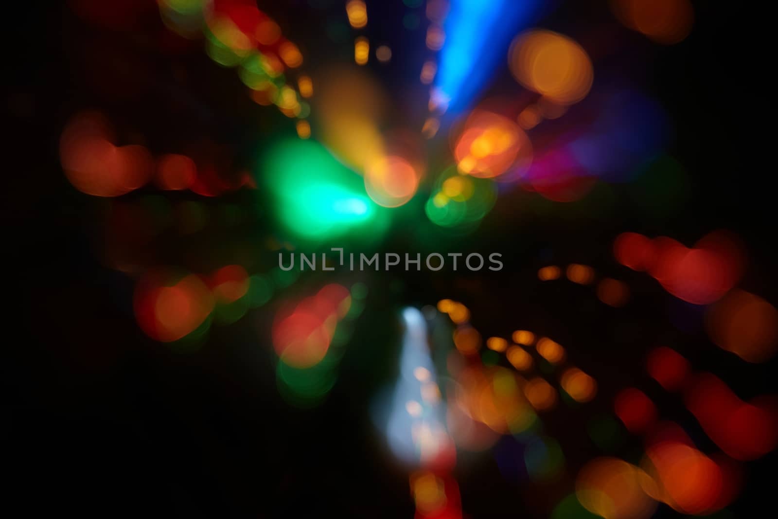 Abstract background with colorful spheres of defocused illumination