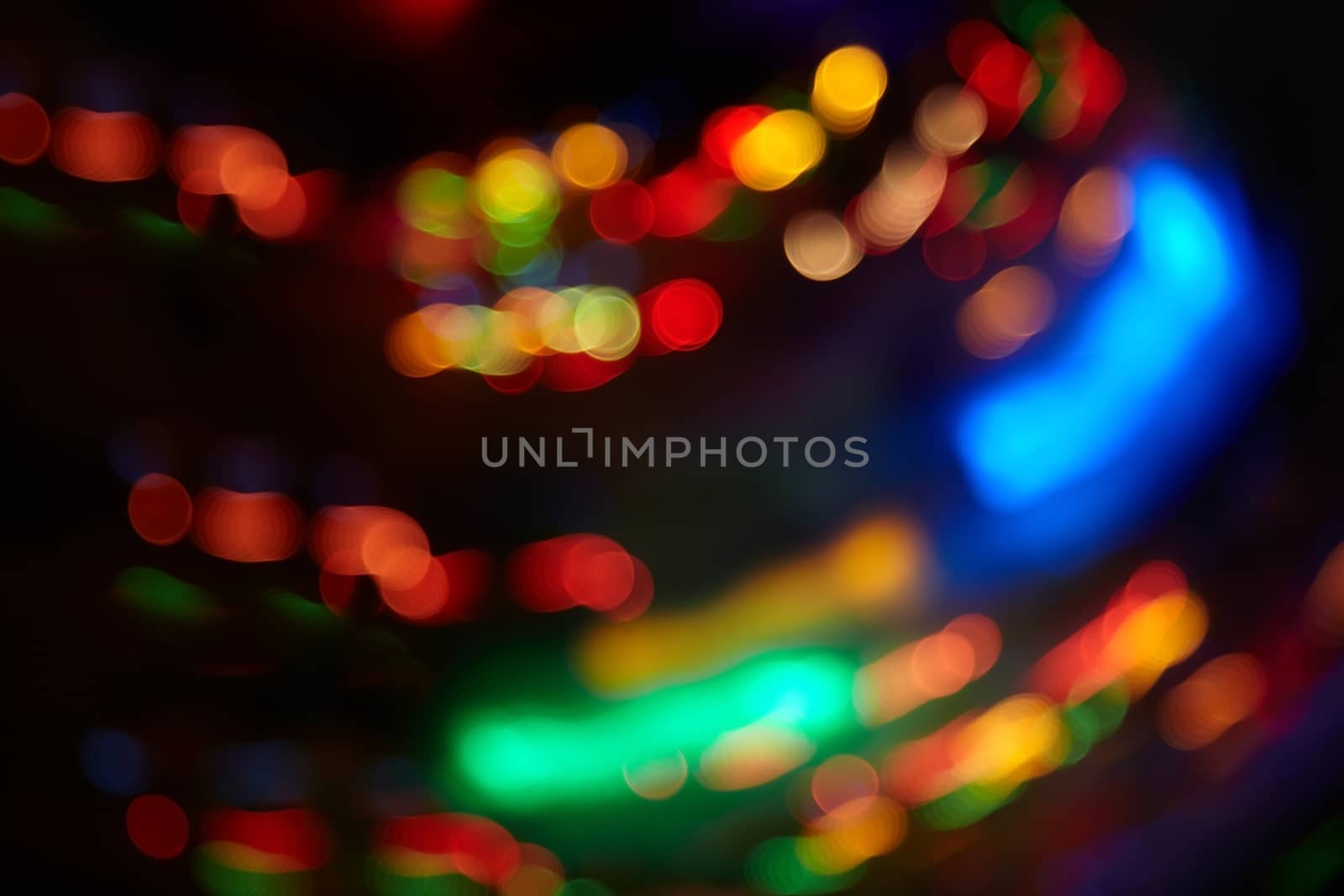 Abstract background with colorful spheres of defocused illumination