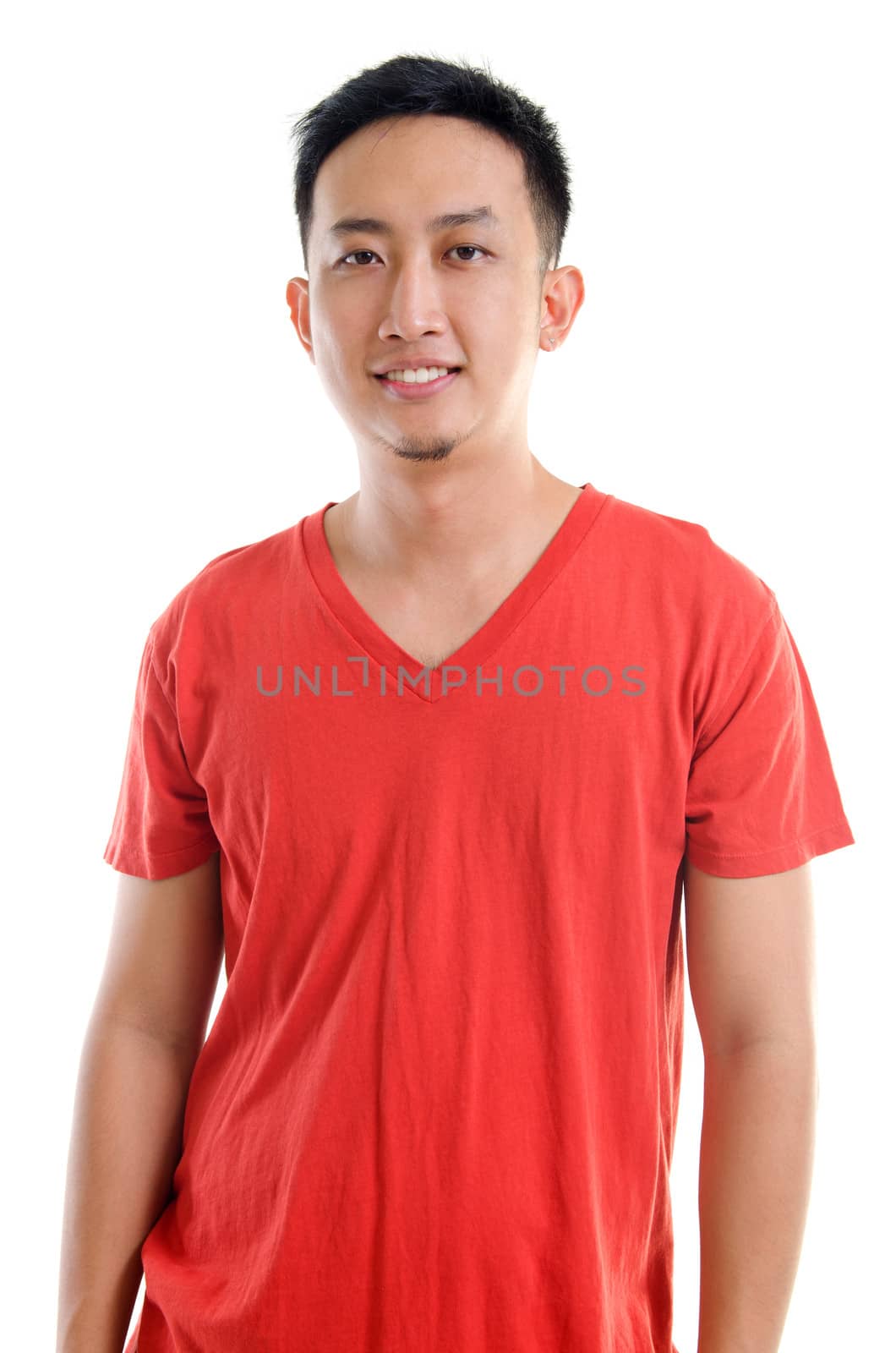 Portrait of young casual Southeast Asian man isolated over white background