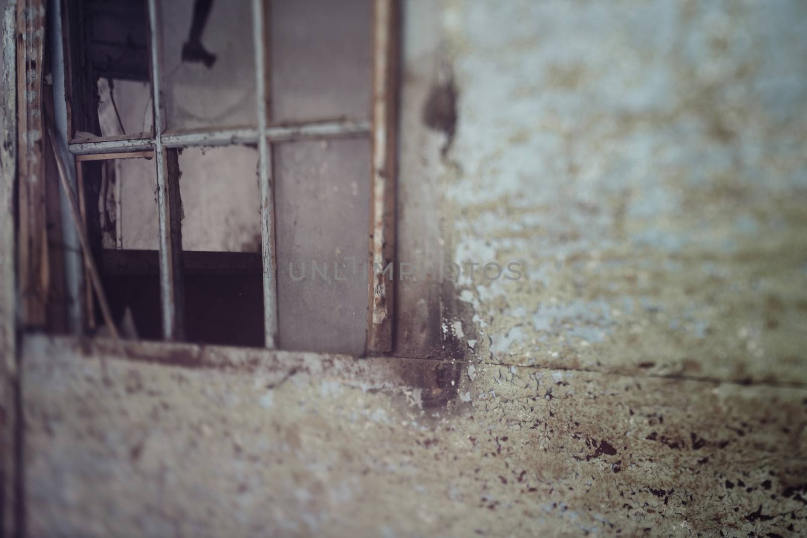 Broken window of the old building