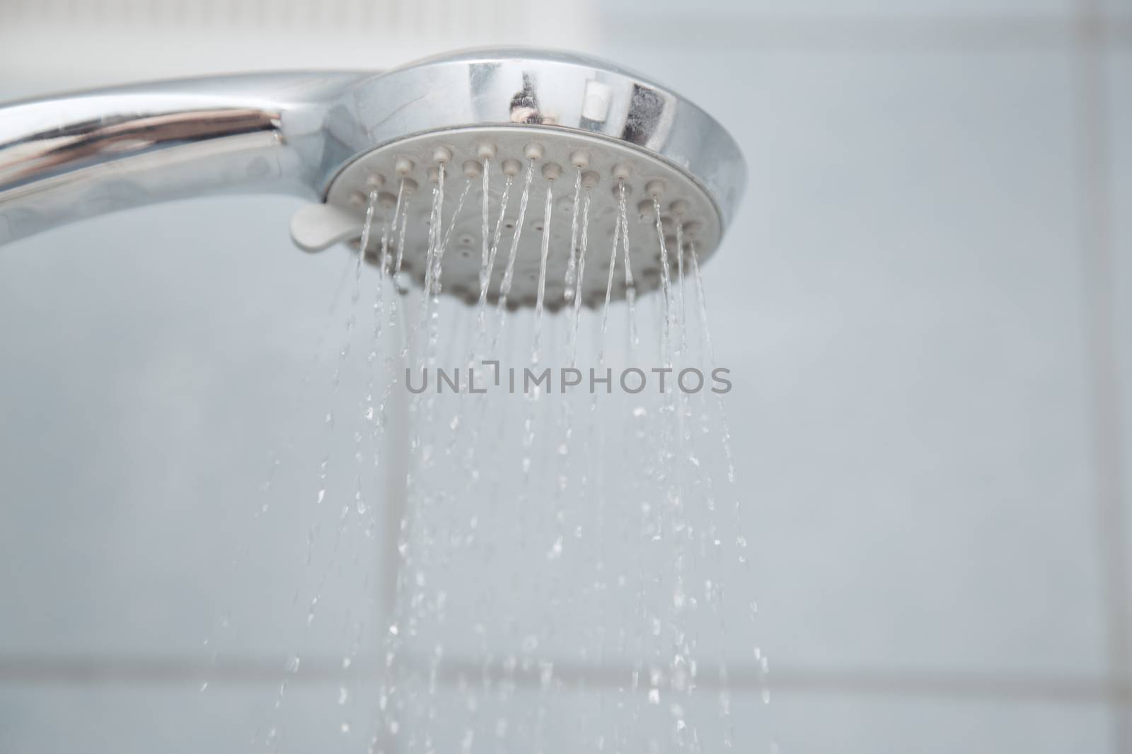 Shower in bathroom with water flowing