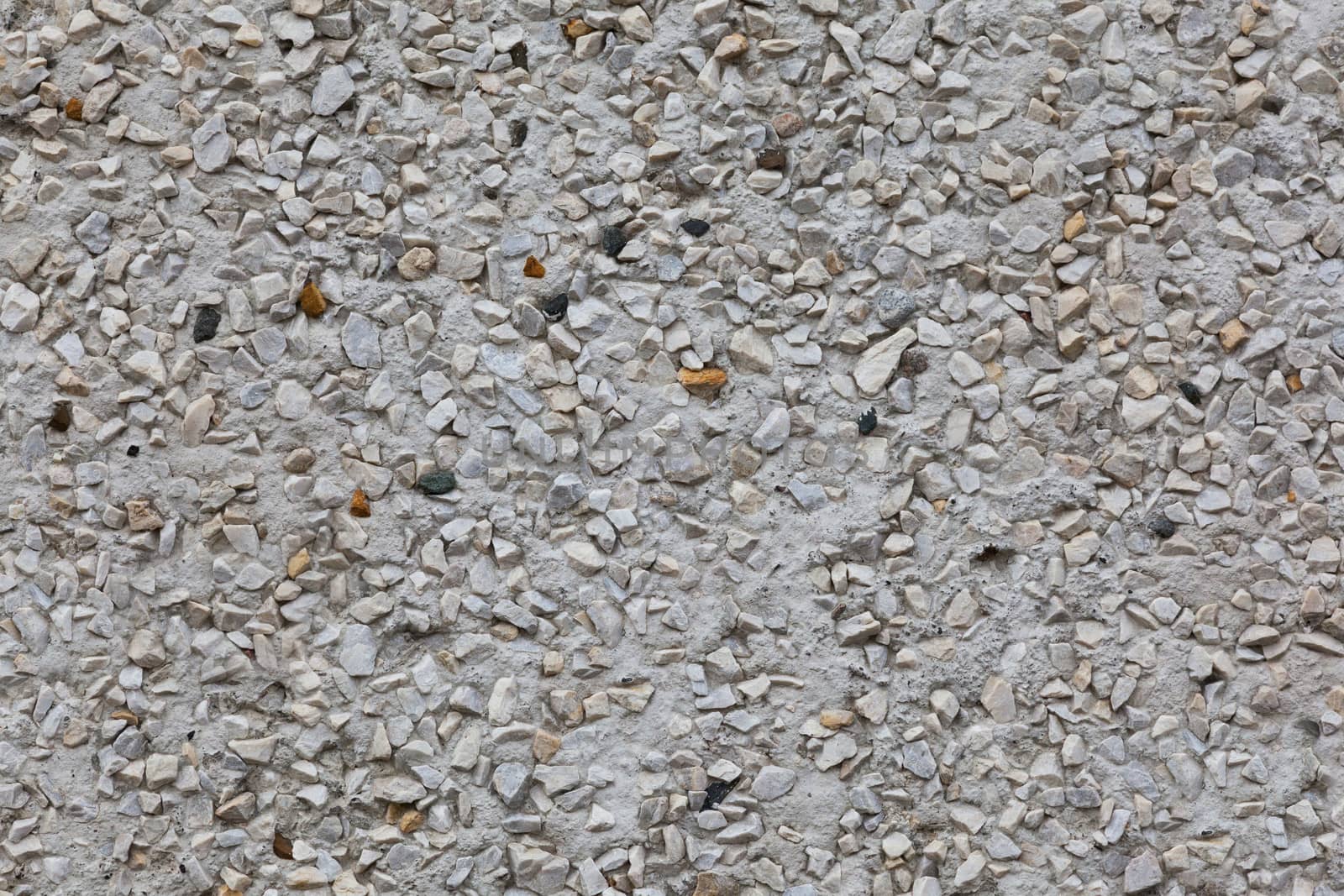 Gray pebble stone tile surface background. by AleksandrN