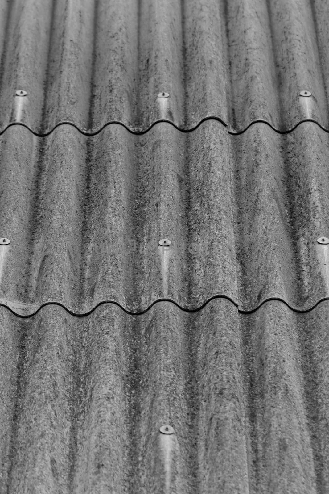 monochrome texture of gray corrugated slate roof