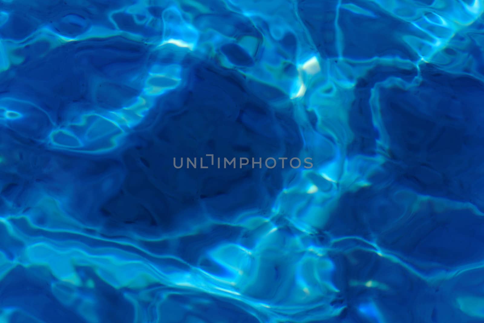 blue abstract background of wavy water surface by NagyDodo