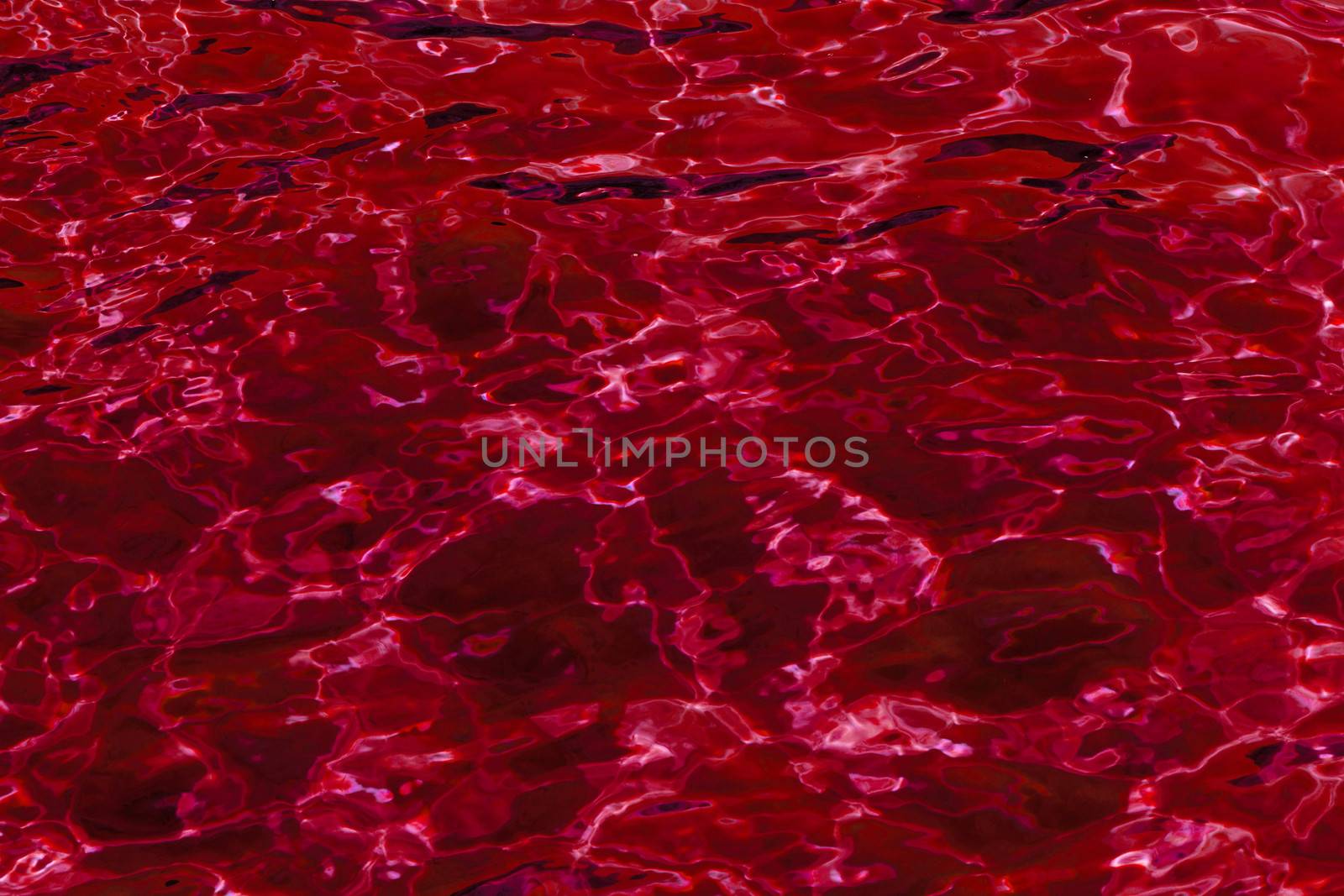 red abstract background of water surface by NagyDodo