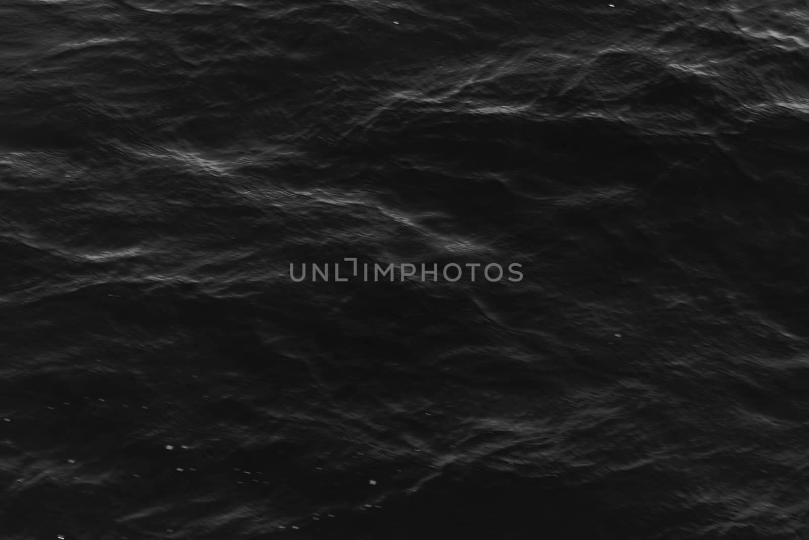 grey abstract background of wavy water surface