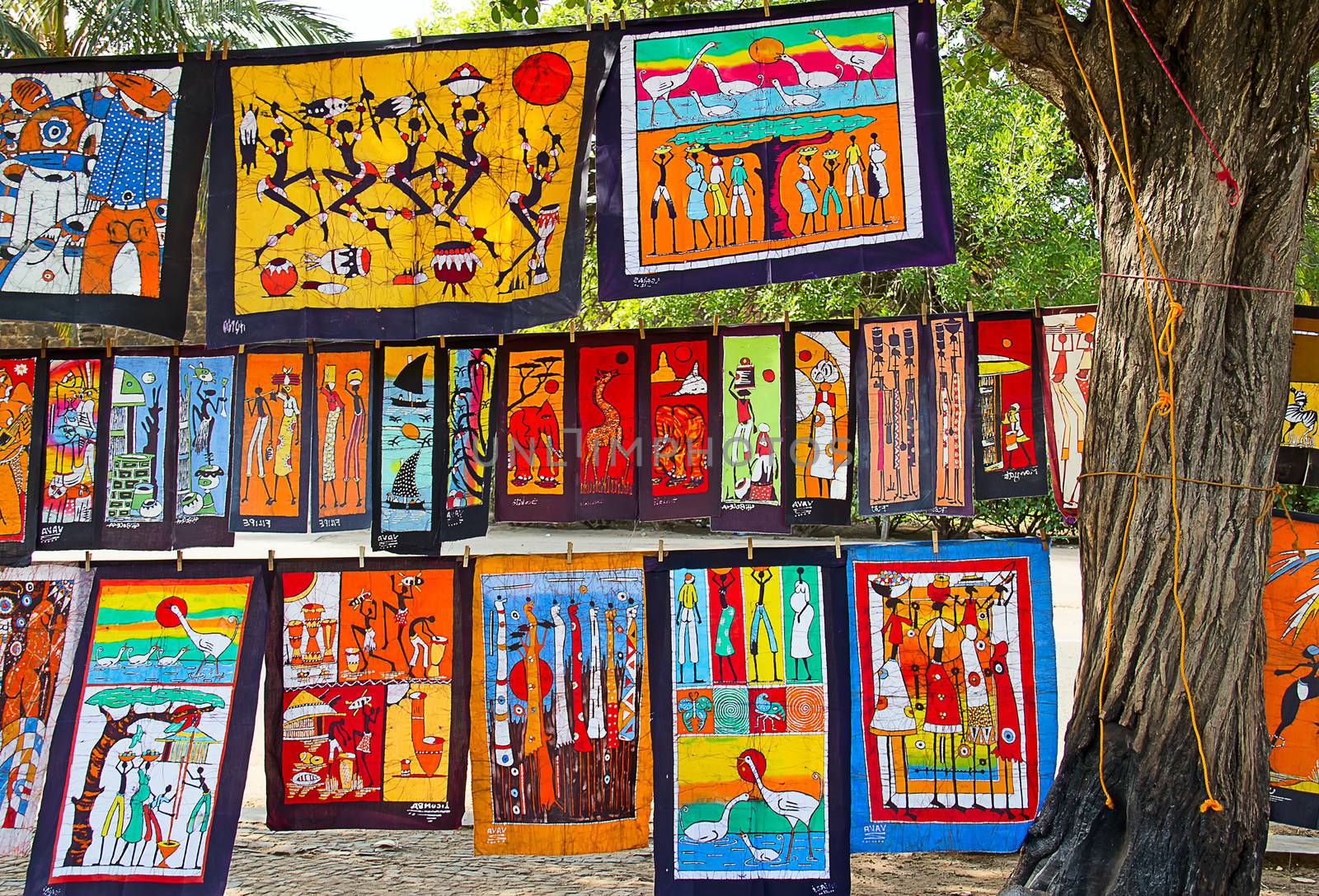 MAPUTO, MOZAMBIQUE - APRIL 29: Traditional african batik painting on the market in Maputo, Mozambique on April 29, 2012. The local market is one of the tourists attraction of the city.