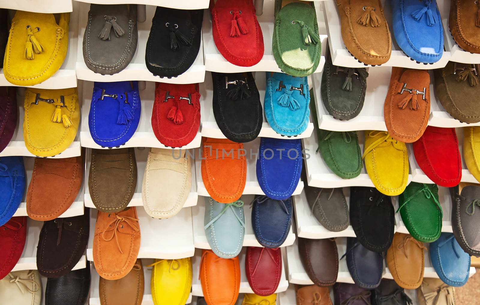 variety of the colorful leather shoes in the shop 