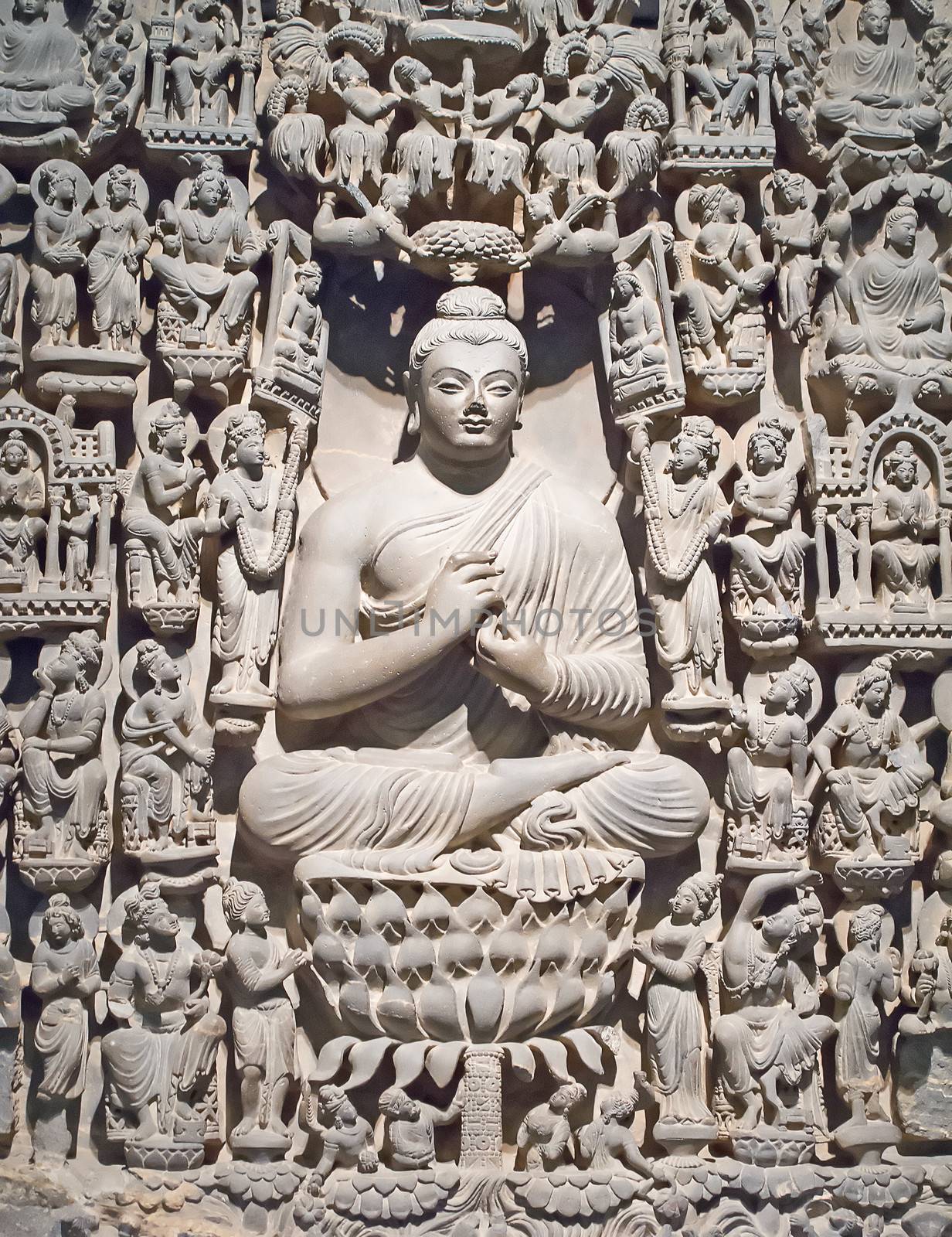 Ancient Buddha image carved on the sand stone