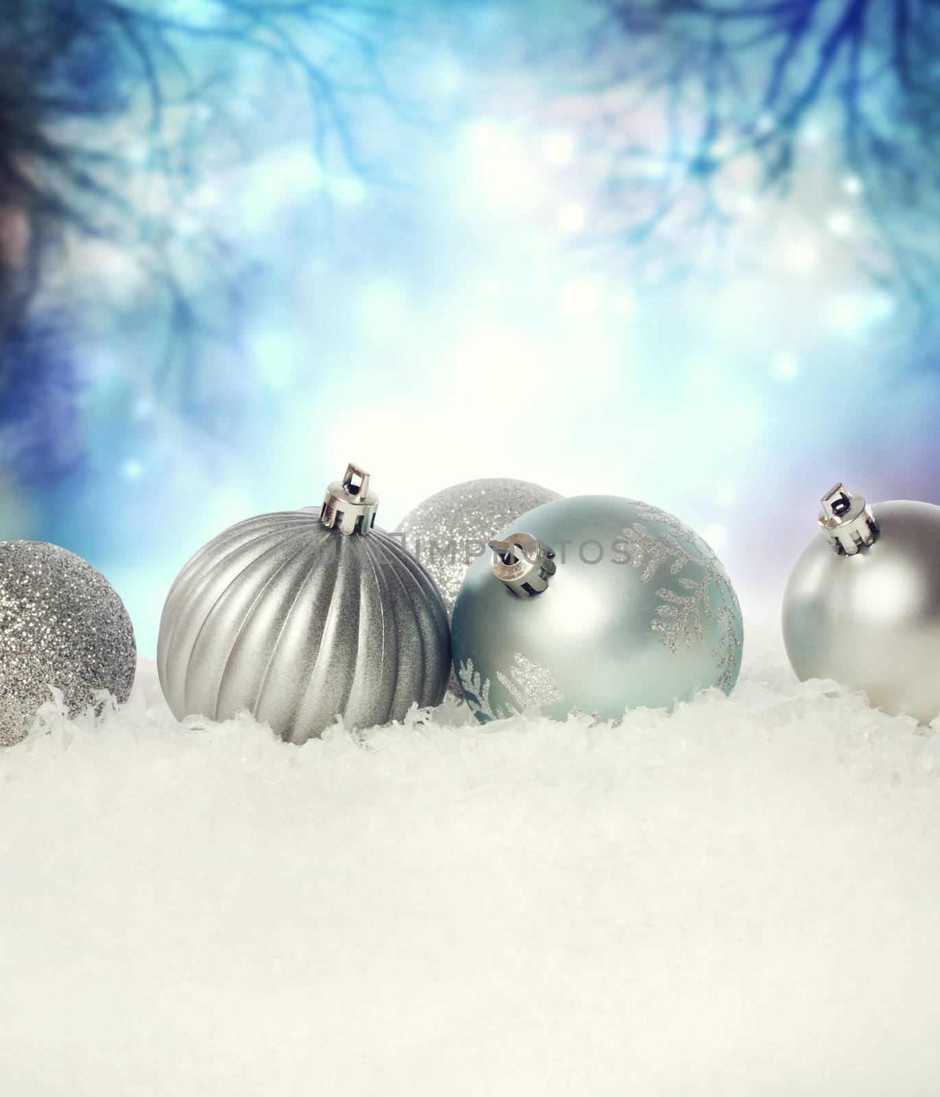 Christmas baubles on the snow by melpomene