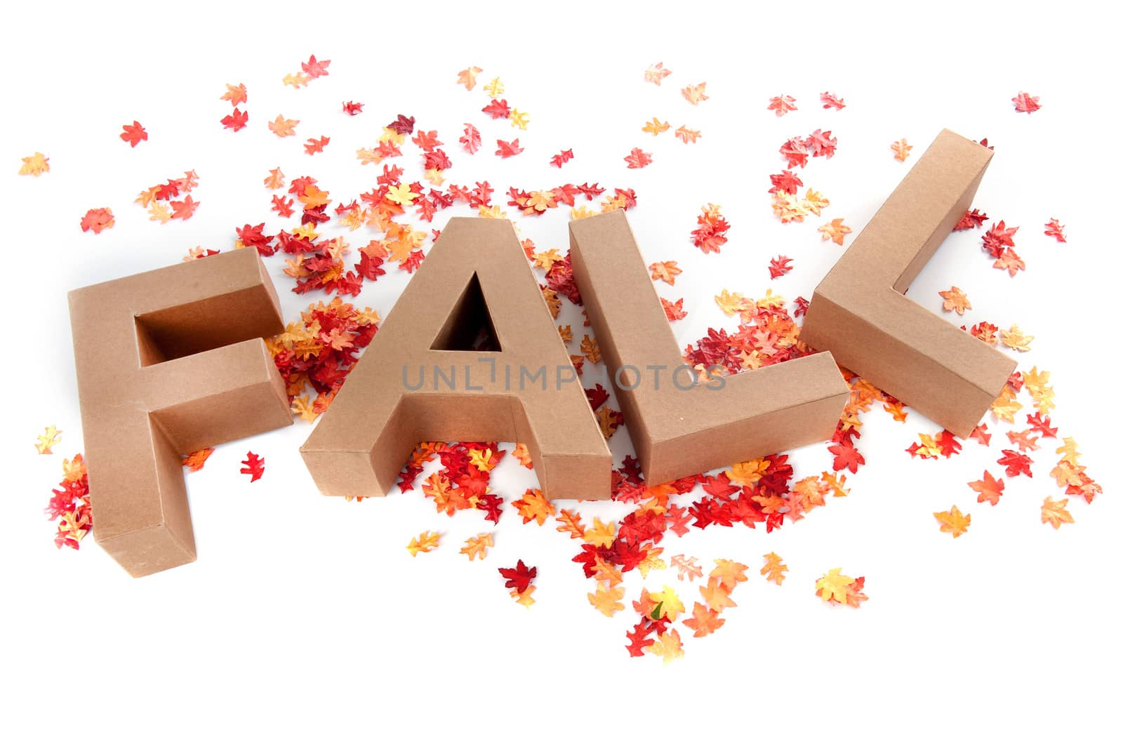 Letters make the word Fall, with a lot of Autumn leaves