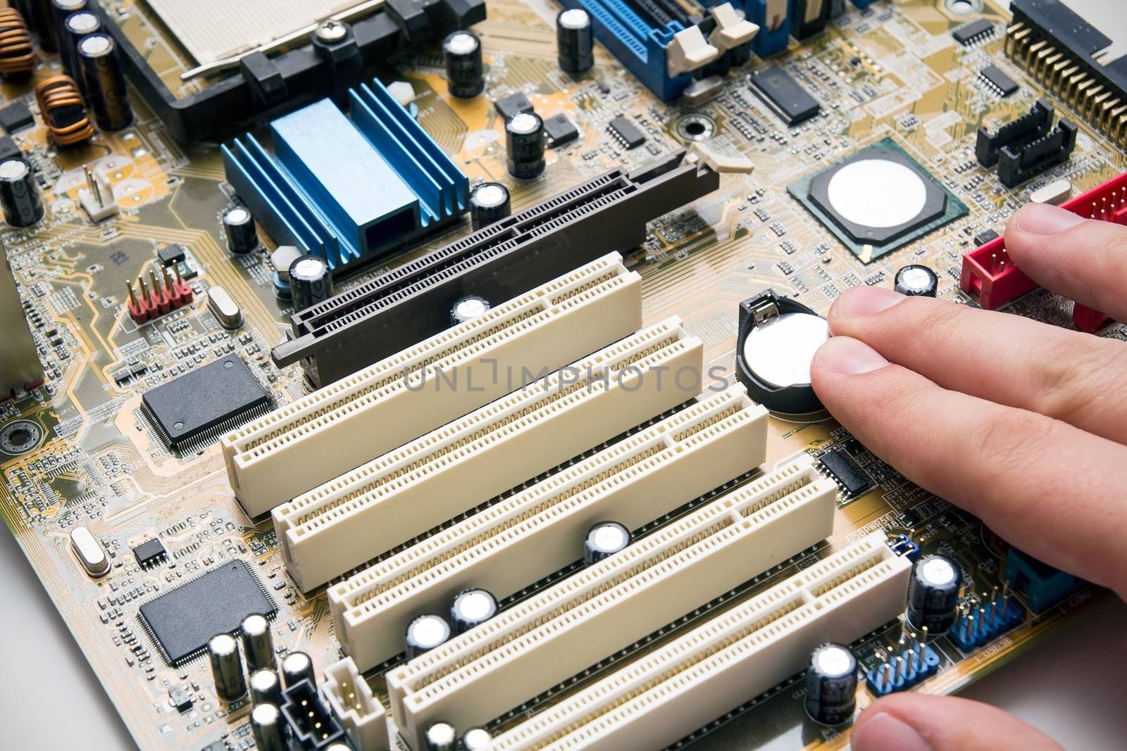 Hand install battery to PC motherboard by simpson33