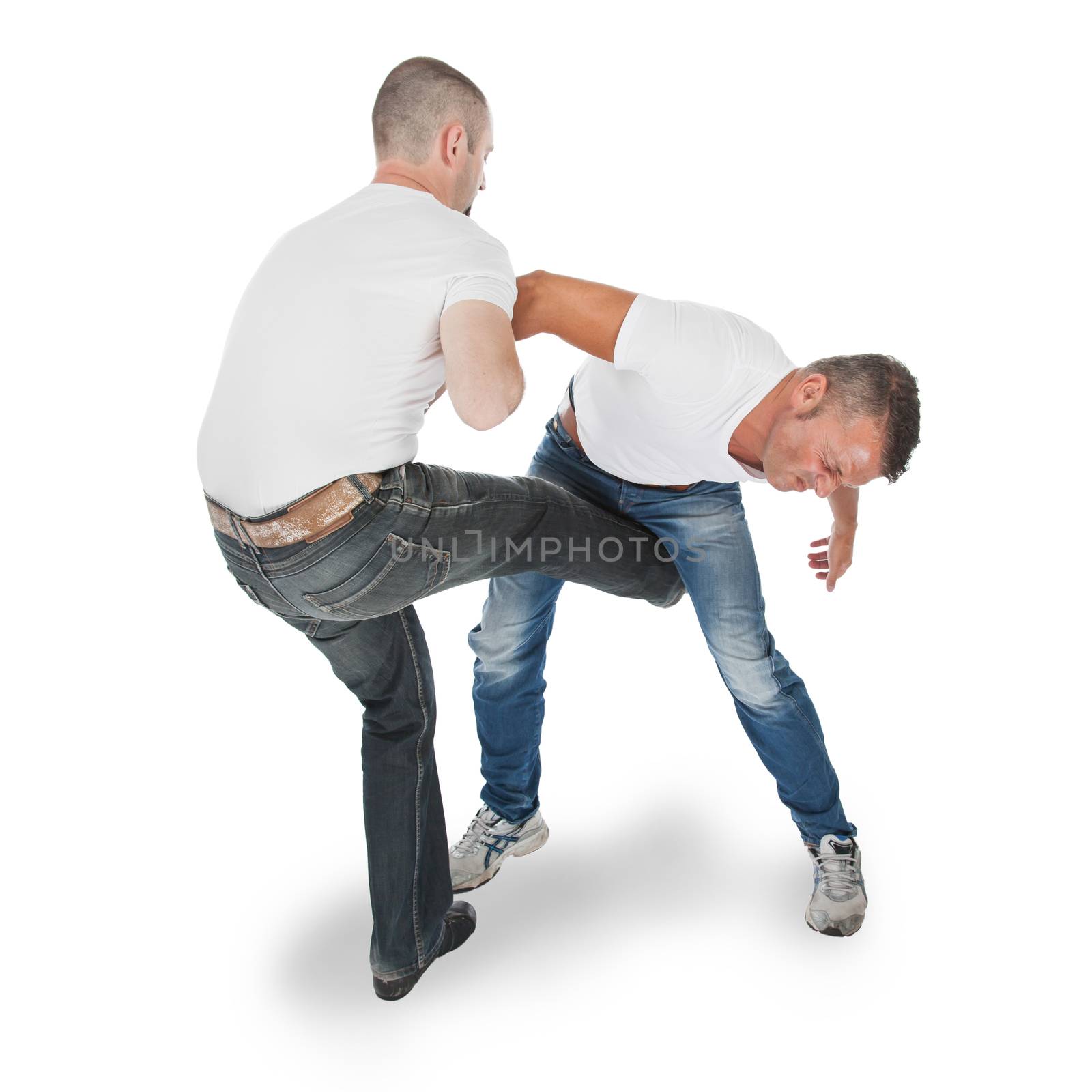 Man defending an attack from another man, selfdefense by michaklootwijk