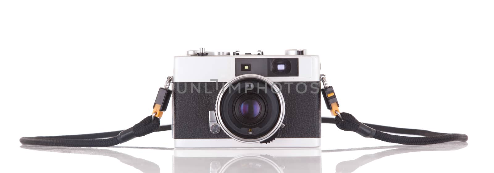 Old vintage camera isolated on white background