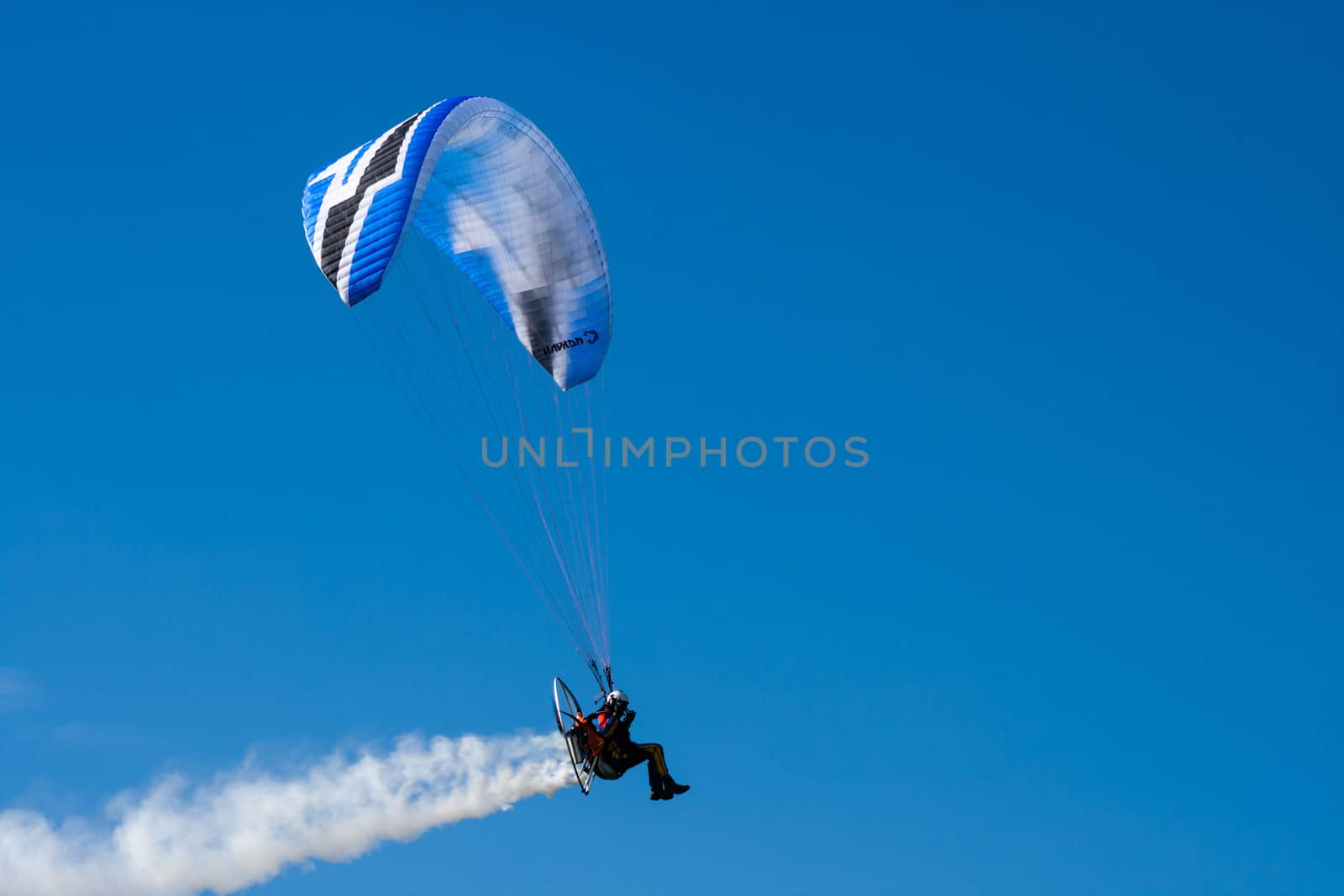 The recreational and competitive adventure sport of flying paragliders.