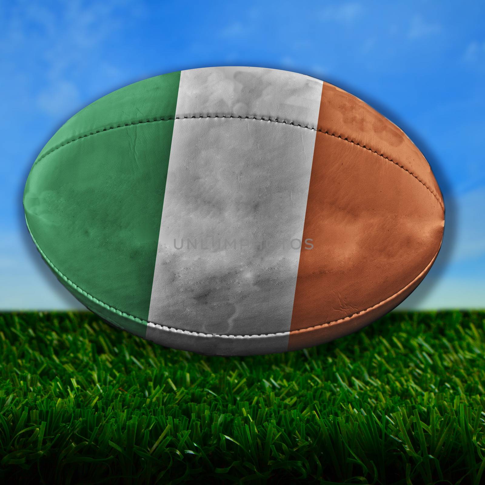Rugby ball with Ireland flag over grass