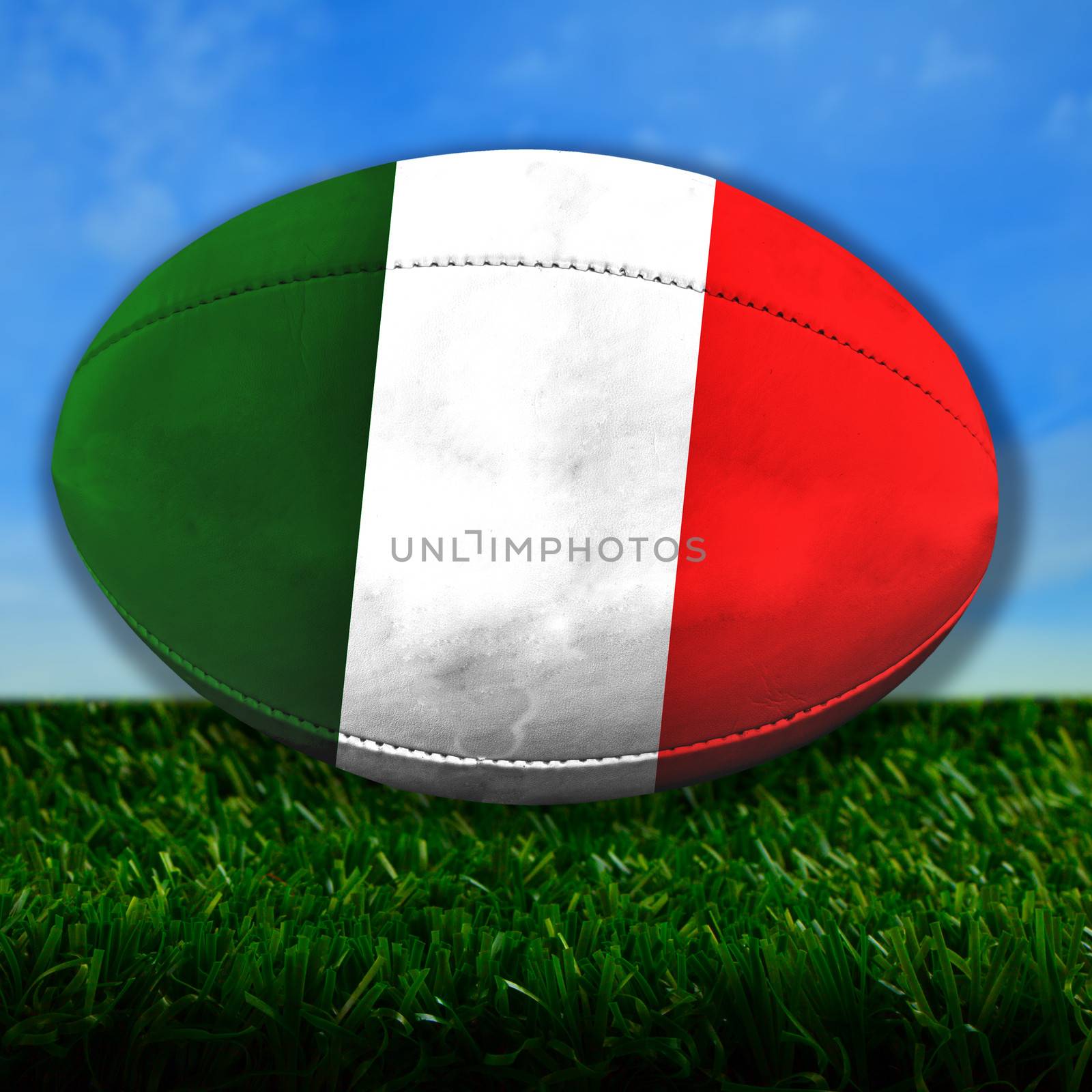 Rugby ball with Italy flag over grass