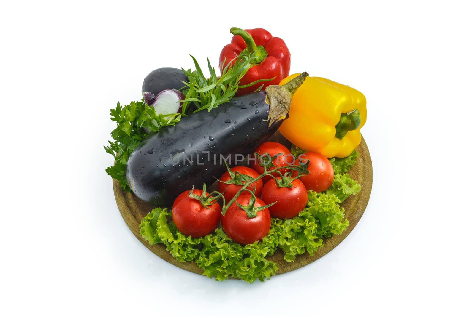 Fresh vegetables on a sheet of white plastic, close-up