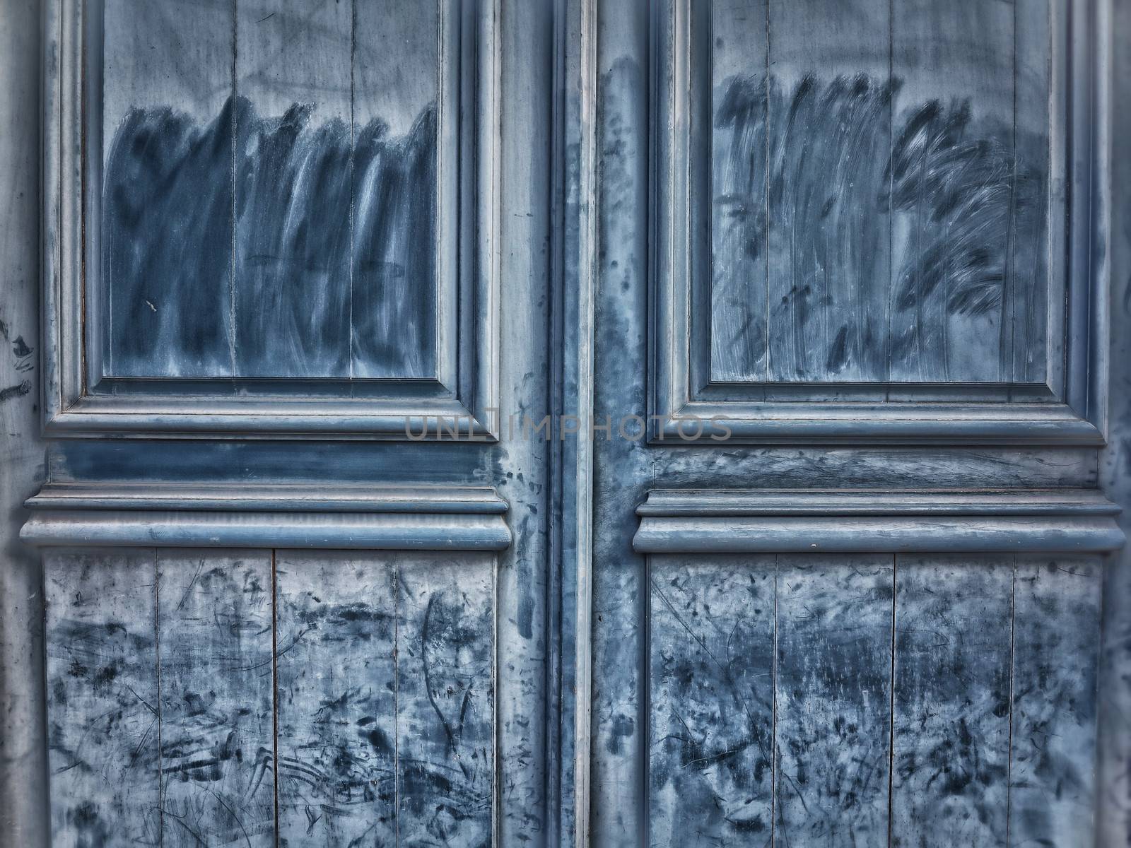 Old painted and wooden door - France.