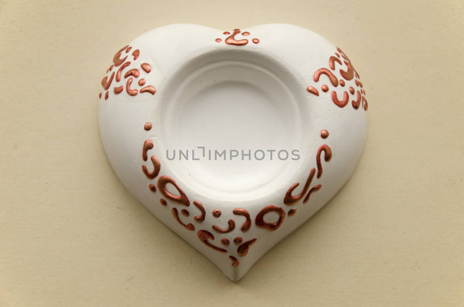 Handmade clay pottery stand candle in the form of heart by pt-home