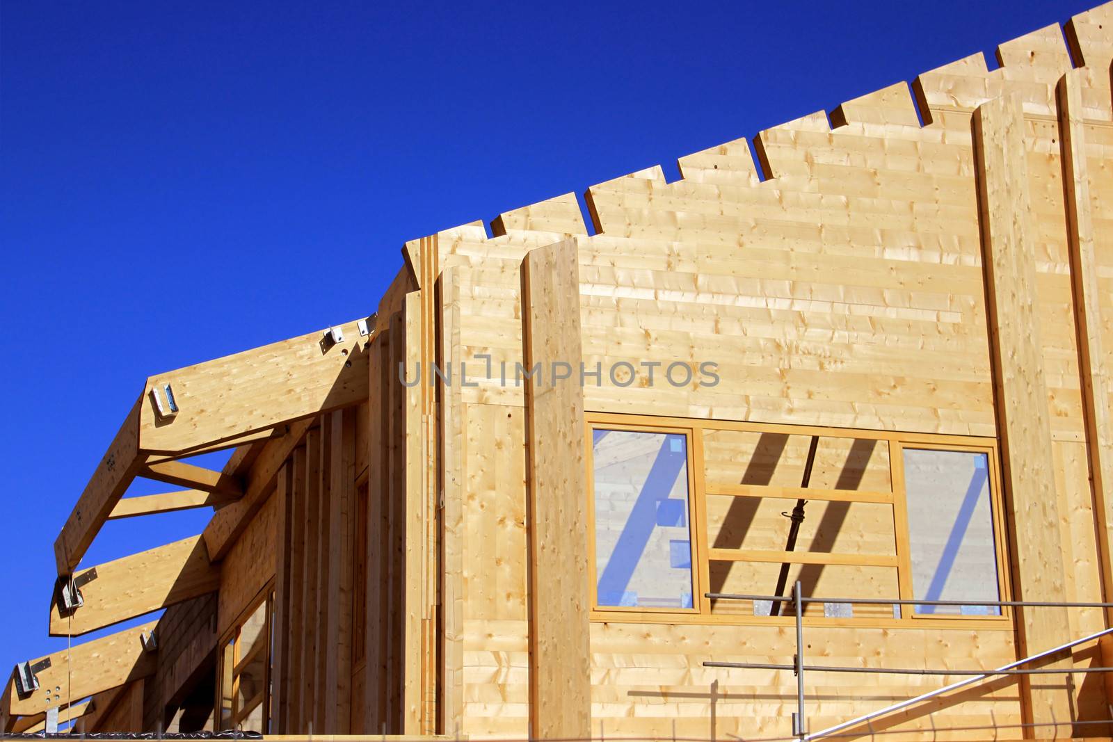 Natural wood construction of a house or a trade for a green energy isolation