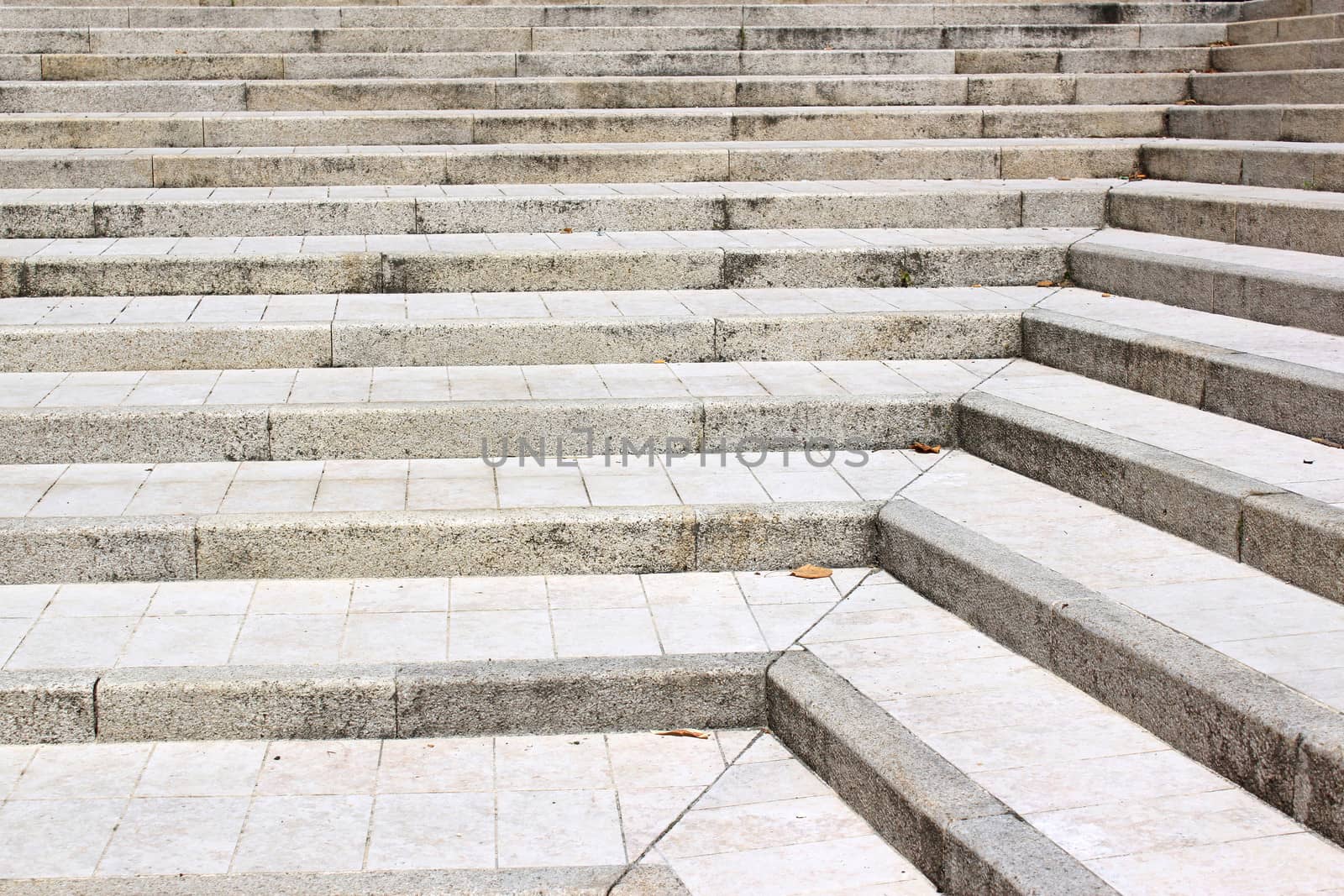 tiled concrete stairs outside in a city