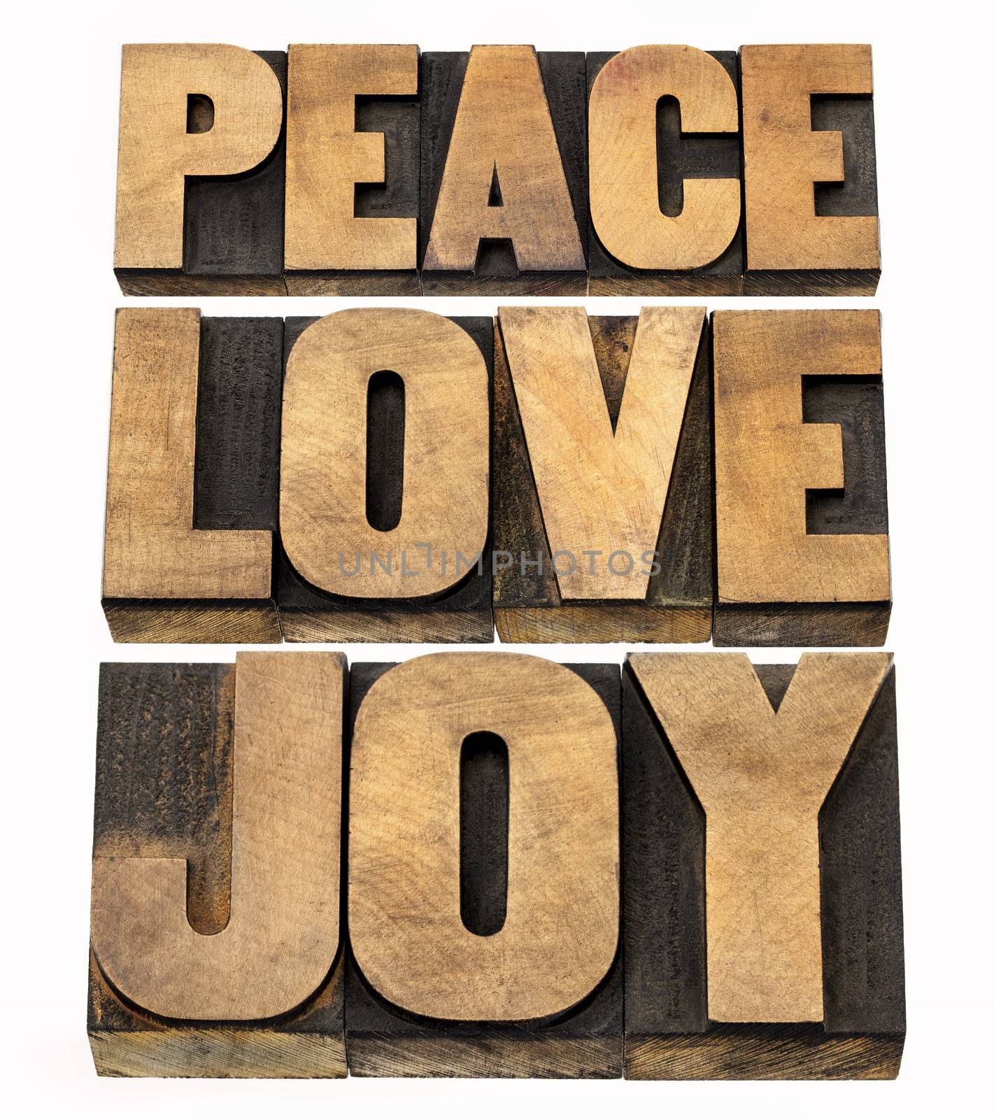 peace, love and joy word abstract - a collage of isolated text in letterpress wood type