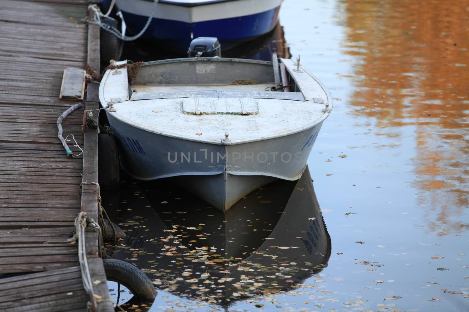 old motor boat at the pier front view