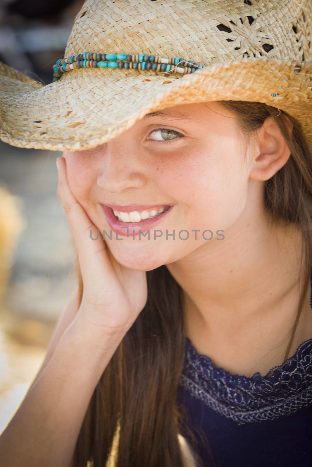 Preteen Girl Portrait Wearing Cowboy Hat by Feverpitched