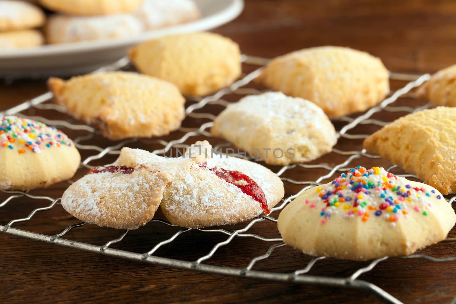 A variety of Italian cookies on a cooling on a rack.