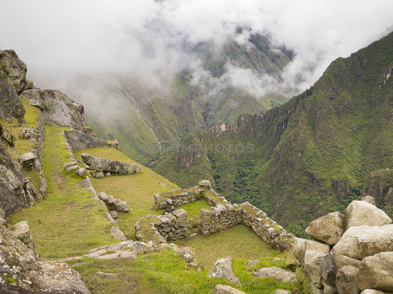 The Terraced Fields in the upper Agricultural Sector of the Machu Picchu over the Urubamba river valley, Cusco Region, Peru.