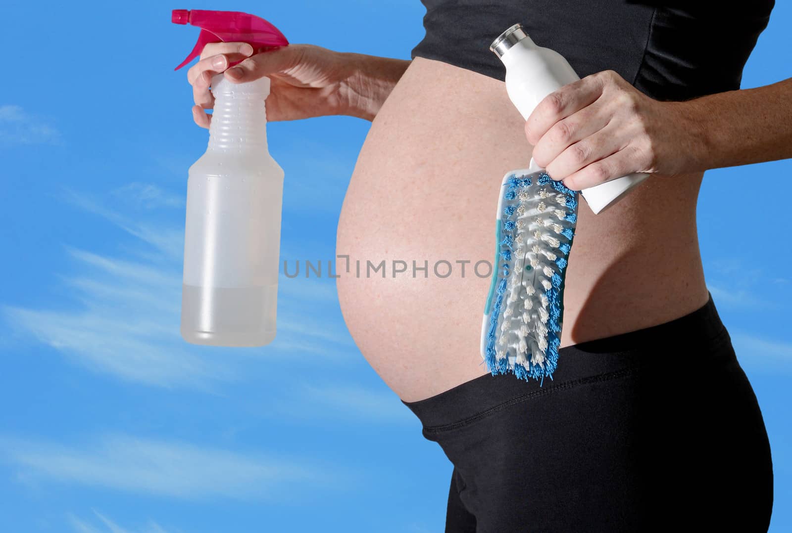 pregnant woman and cleaning products by ftlaudgirl
