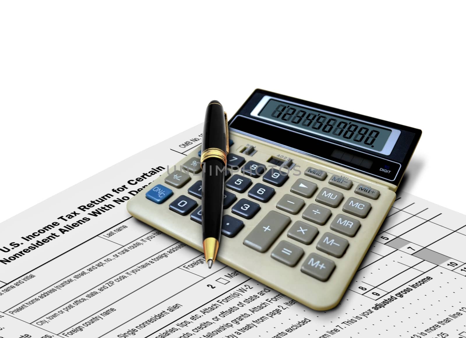 Calculator and Pen on Tax Form