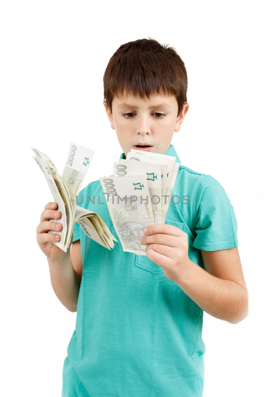 man boy holding czech crown banknotes isolated on white background
