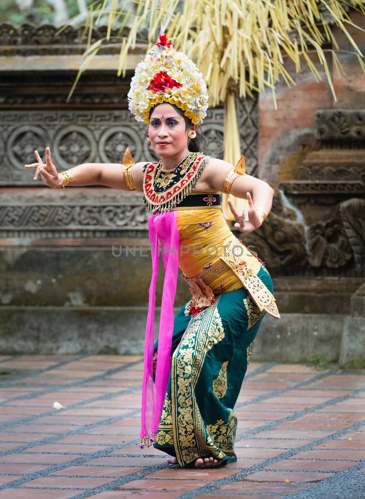 UBUD, BALI, INDONESIA - SEP 21: Unidentified woman performs Legong dance, the traditionala form of Balinese dance on Sep 21, 2012 in Ubud, Bali, Indonesia. Legong is popular tourist attraction on Bali