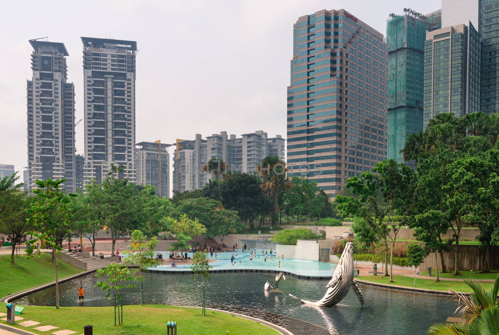 KUALA LUMPUR - JUN 15: KLCC Park is a public park located near Petronal twin towers on Jun 15, 2013 in Kuala Lumpur, Malaysia. 20 hectares park was designed by Roberto Burle Marx in 1980.