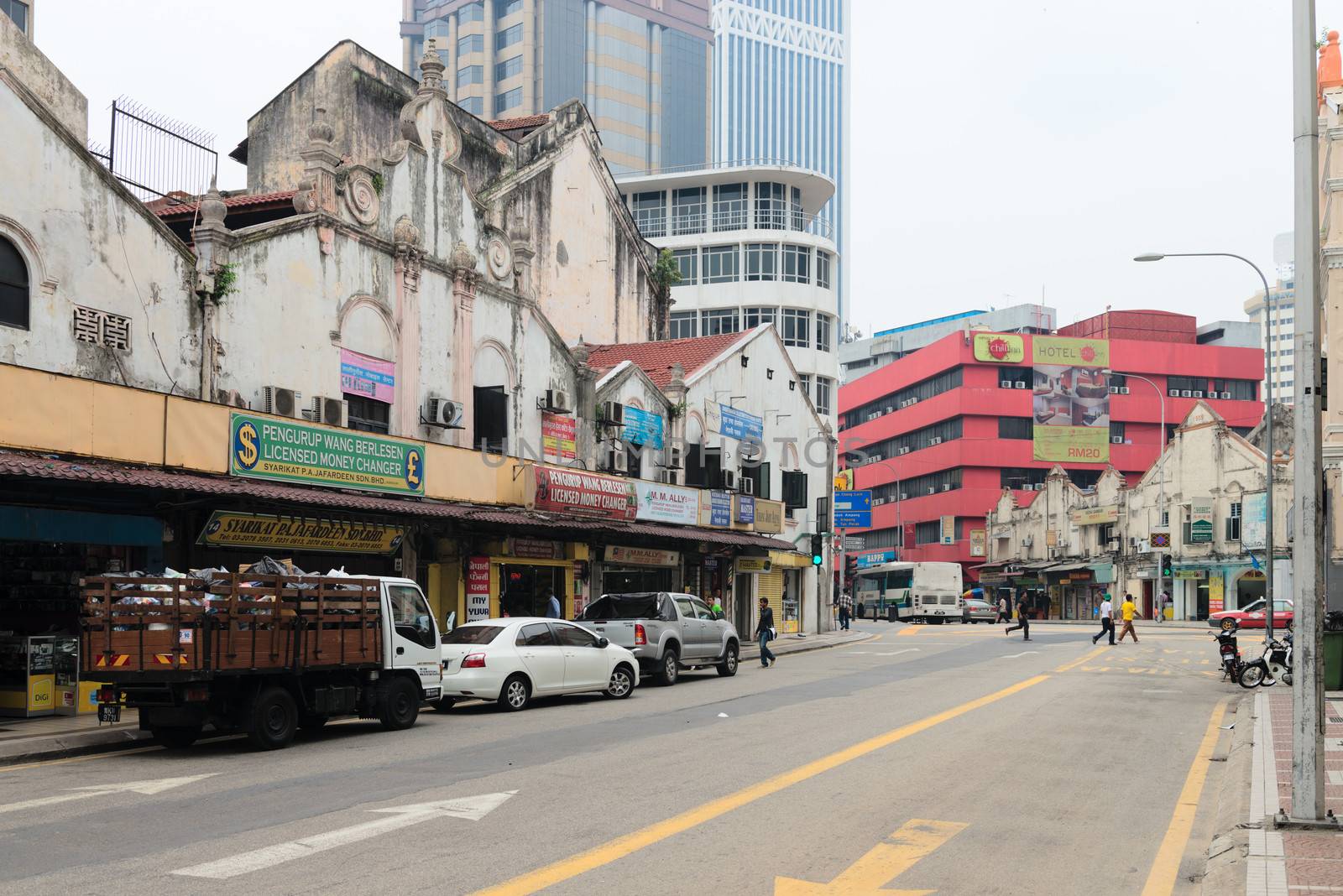 KUALA LUMPUR - JUN 15: Grecian-Spanish style buildings on Little India street on Jun 15, 2013 in Kuala Lumpur, Malaysia. Chinatown is home to much of the city���s budget accommodation.