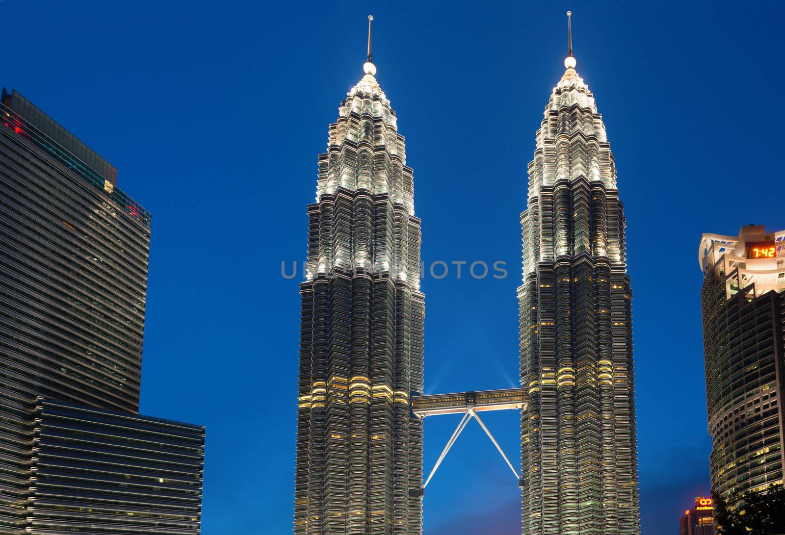 KUALA LUMPUR - JUN 15: Petronas Towers on Jun 15, 2013 in Kuala Lumpur, Malaysia. The towers were the tallest buildings in the world from 1998 to 2004  (451.9 m). 