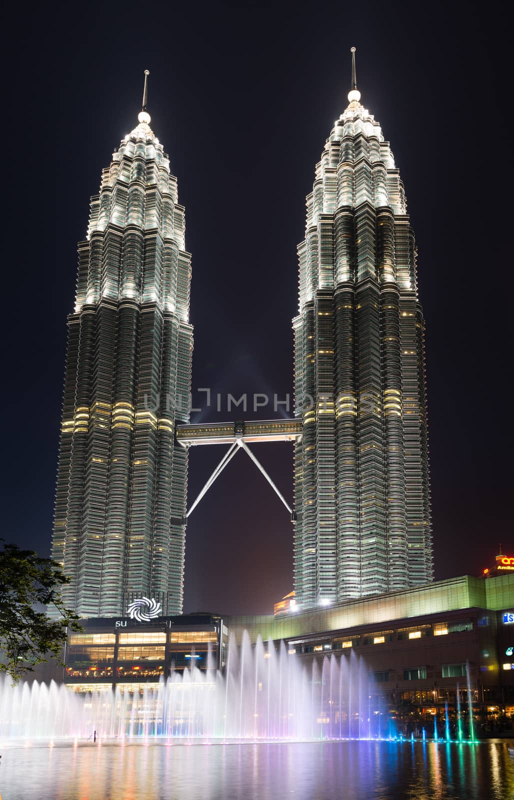 KUALA LUMPUR - JUN 15: Petronas Towers and Suria KLCC on Jun 15, 2013 in Kuala Lumpur, Malaysia. The towers were the tallest buildings in the world from 1998 to 2004  (451.9 m). 