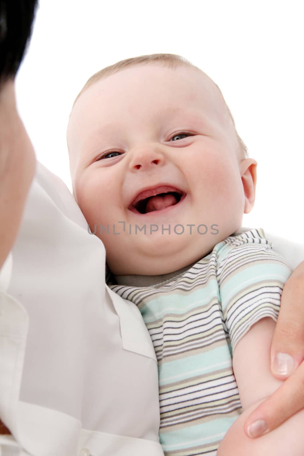 Happy baby in mother's hands by NikolayK