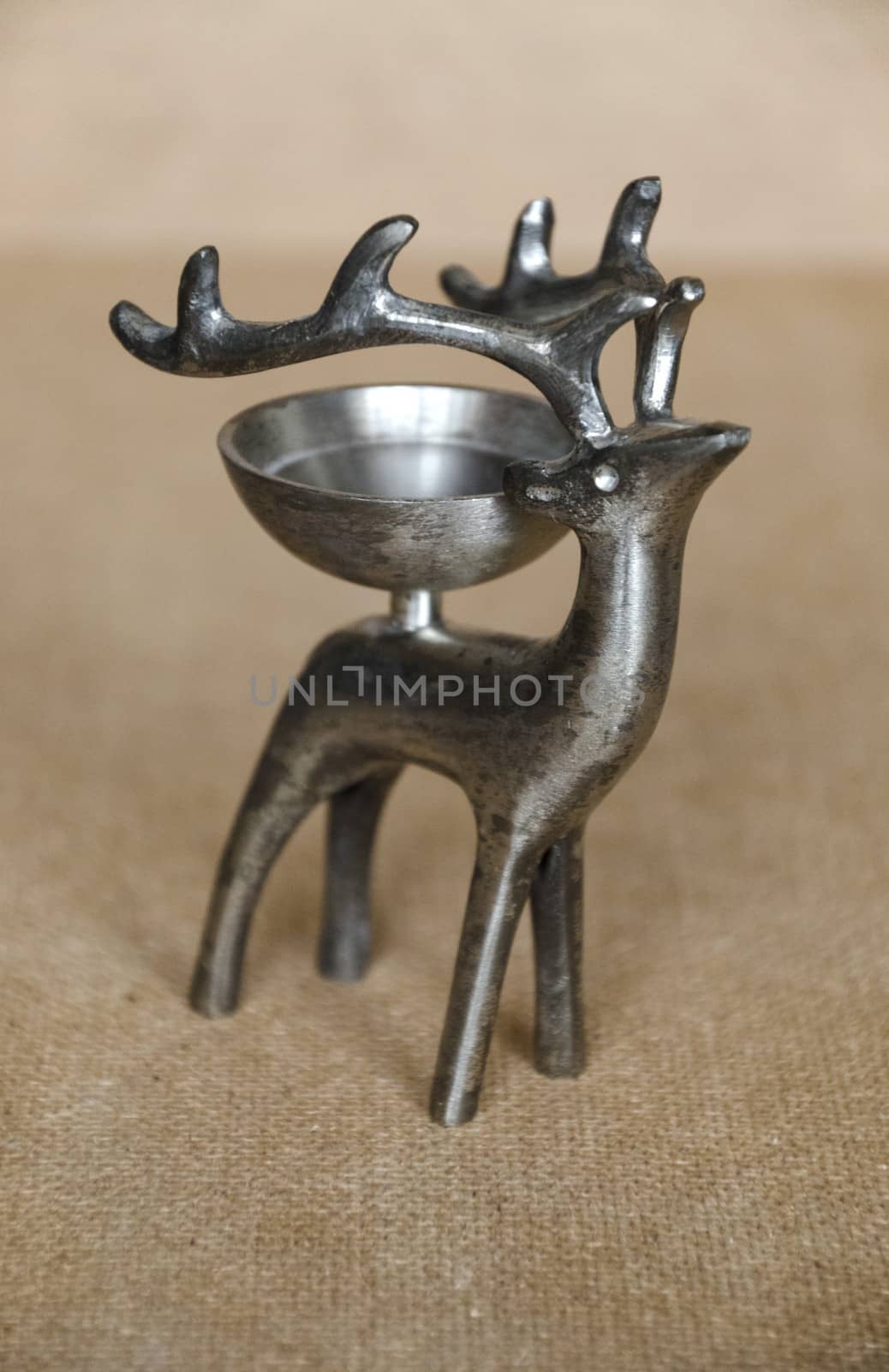 Vintage metal stand-candlestick in the form of a deer with a bow by pt-home